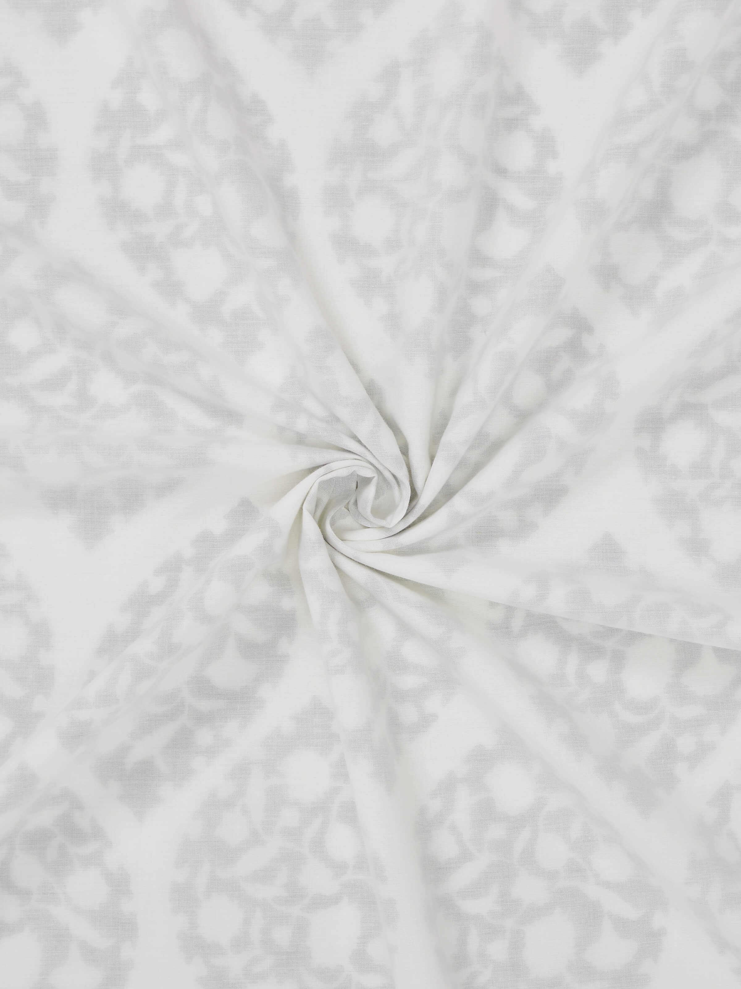 Close-up showing hand block print precision and breathable cotton fabric.