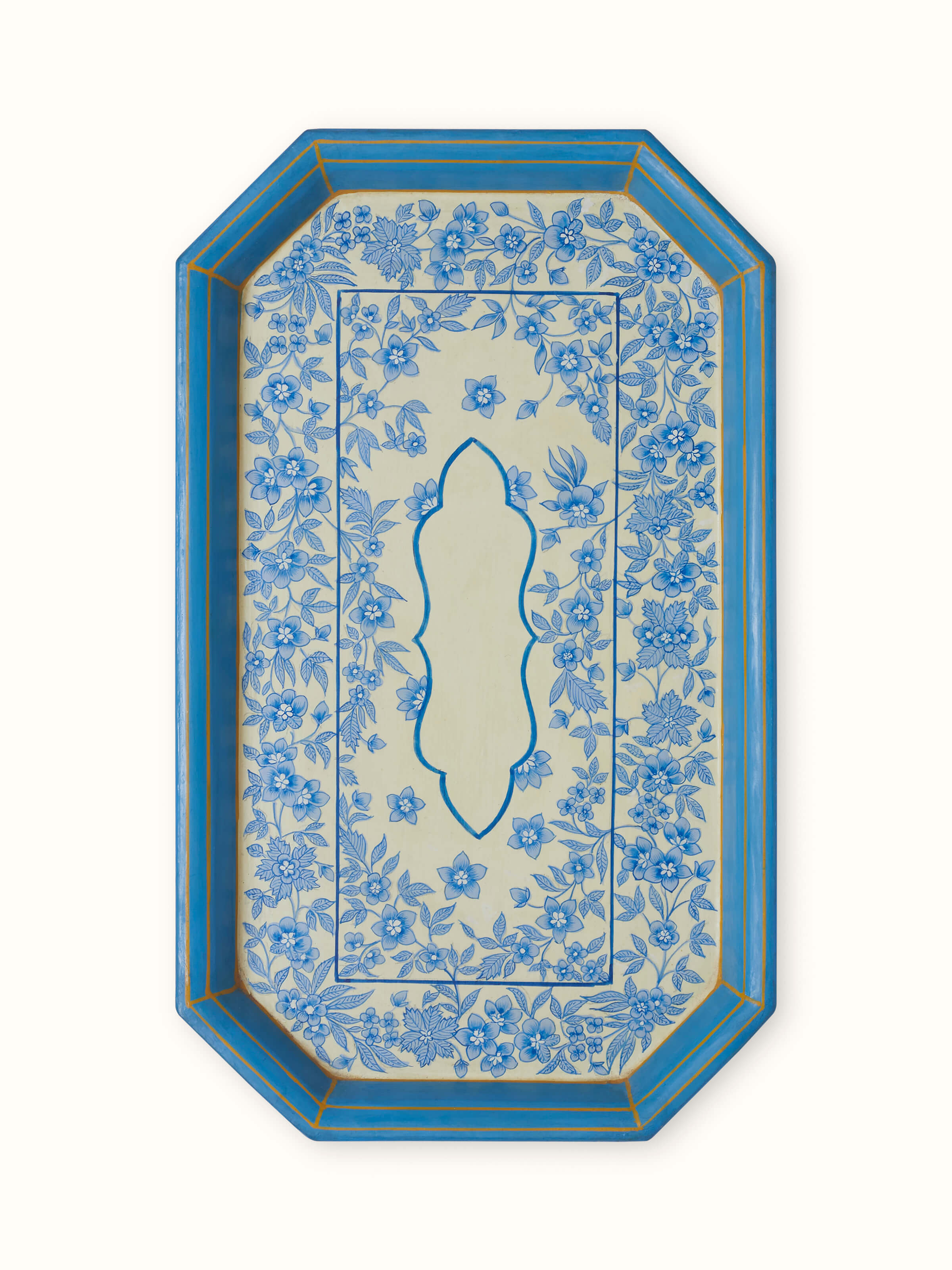 Close-up of multicolor papier-mache decorative tray with vibrant patterns.