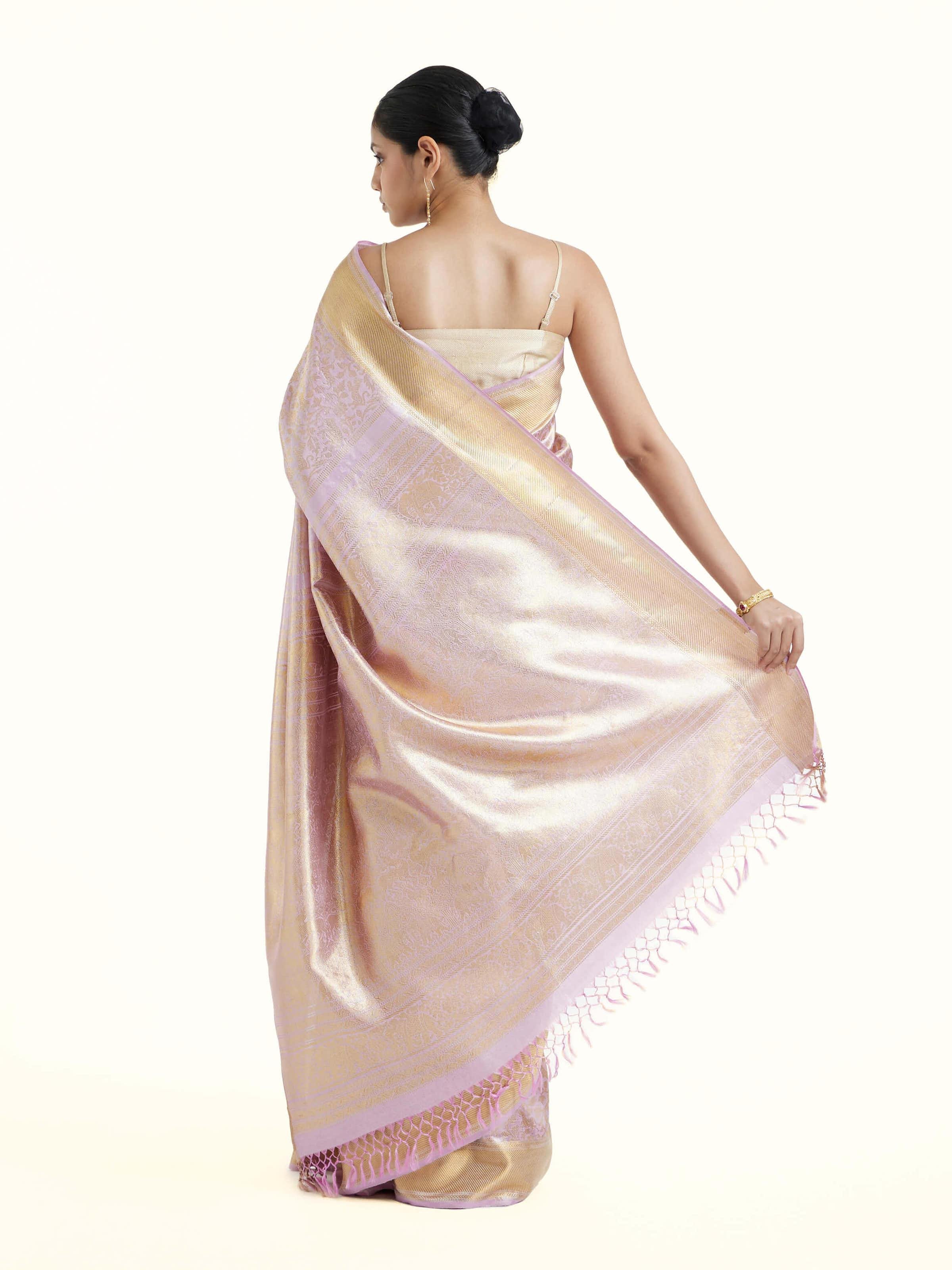 Back view of lavender silk Kancheepuram saree displaying ornate pallu