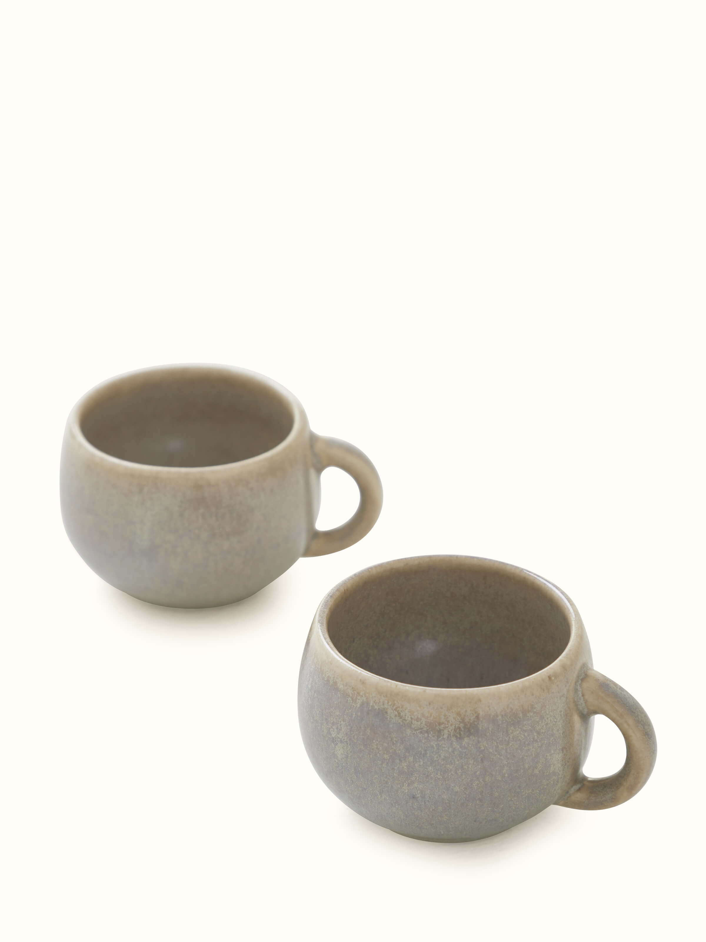 Front view of Khurja Pottery Stoneware Condiment Container Set showing the set of two containers with decorative designs.