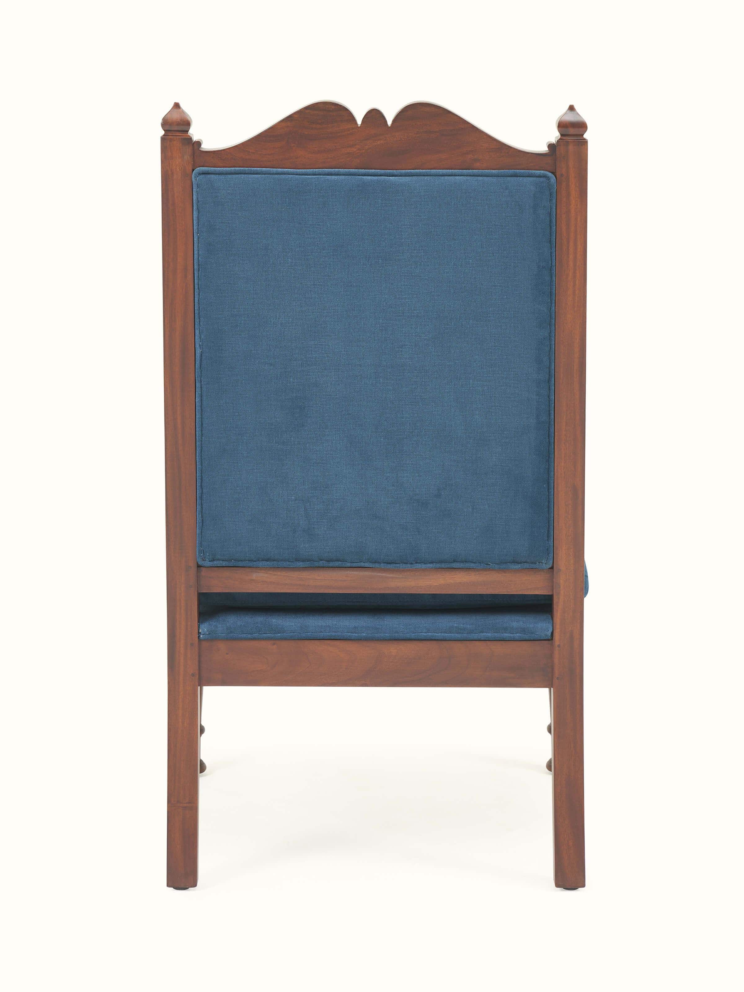 Back view of upholstered mahogany wood arm chair showcasing sleek design and fabric finish