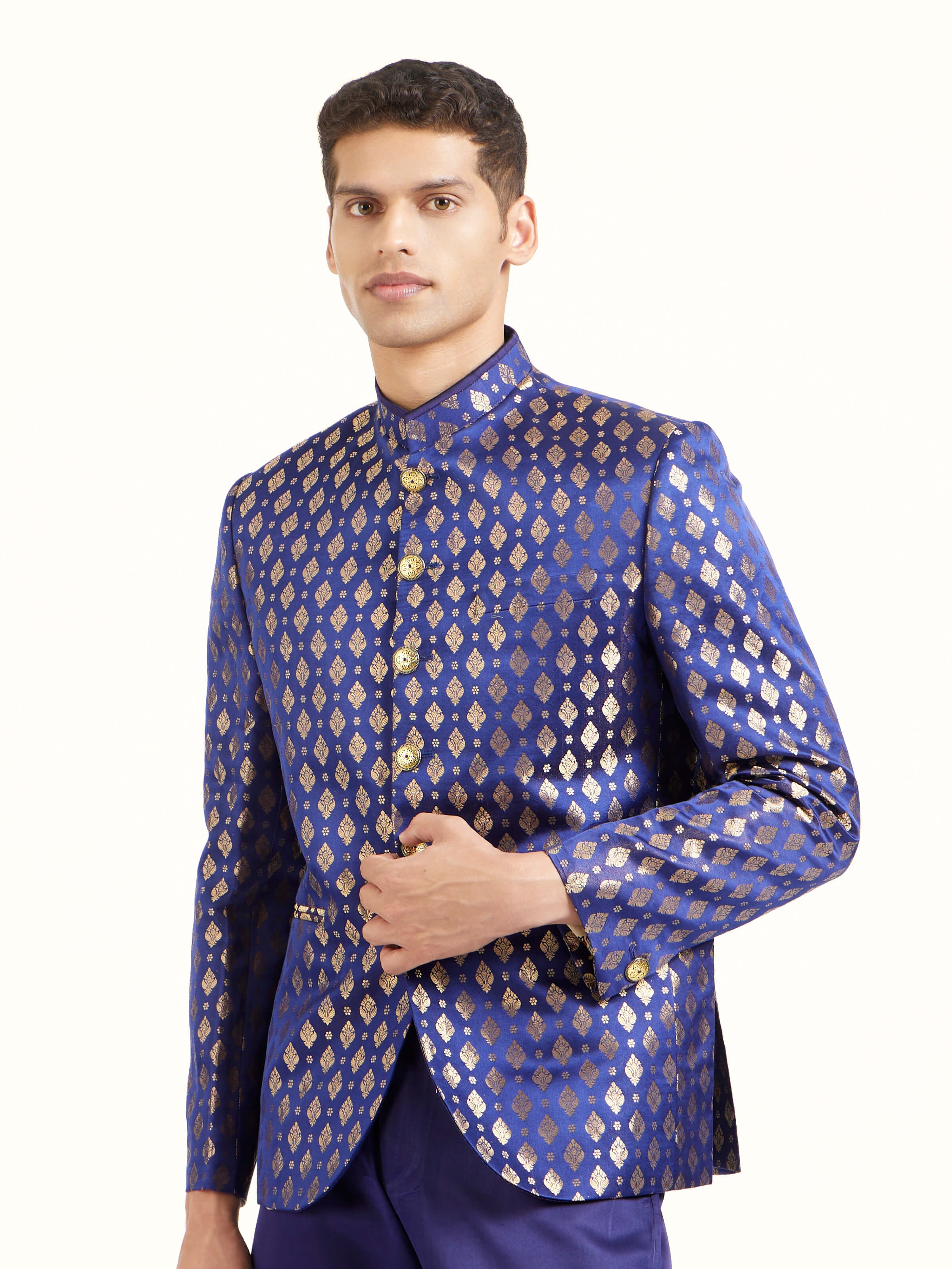 Angled view of navy blue silk Banarasi brocade bandhgala highlighting woven patterns