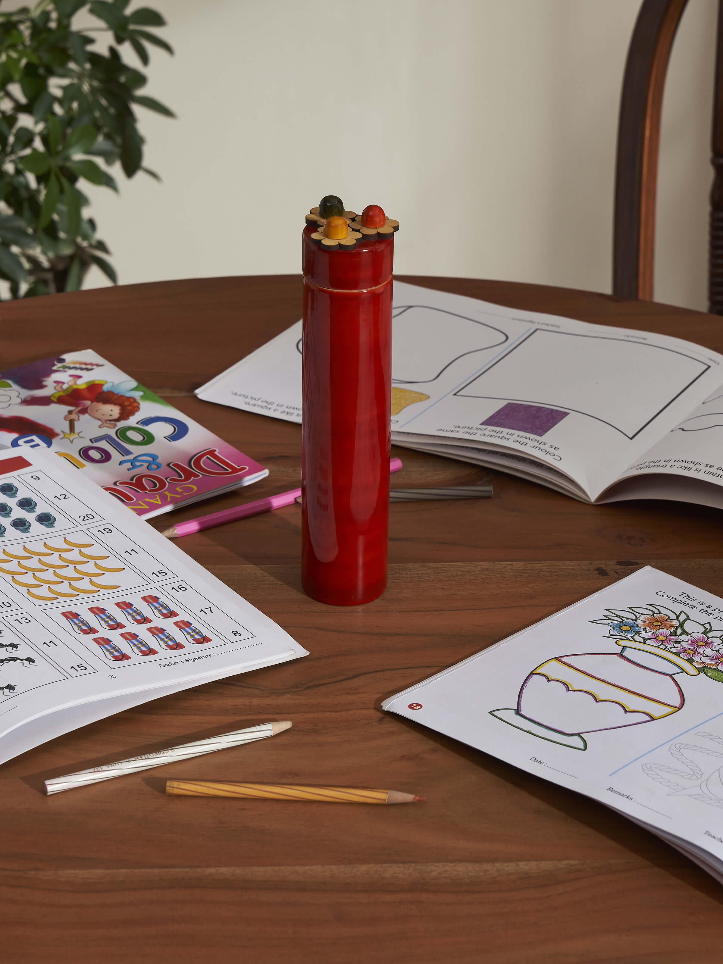 Lifestyle view of Channapatna Ivory Wood Sketch Kase Slim Red