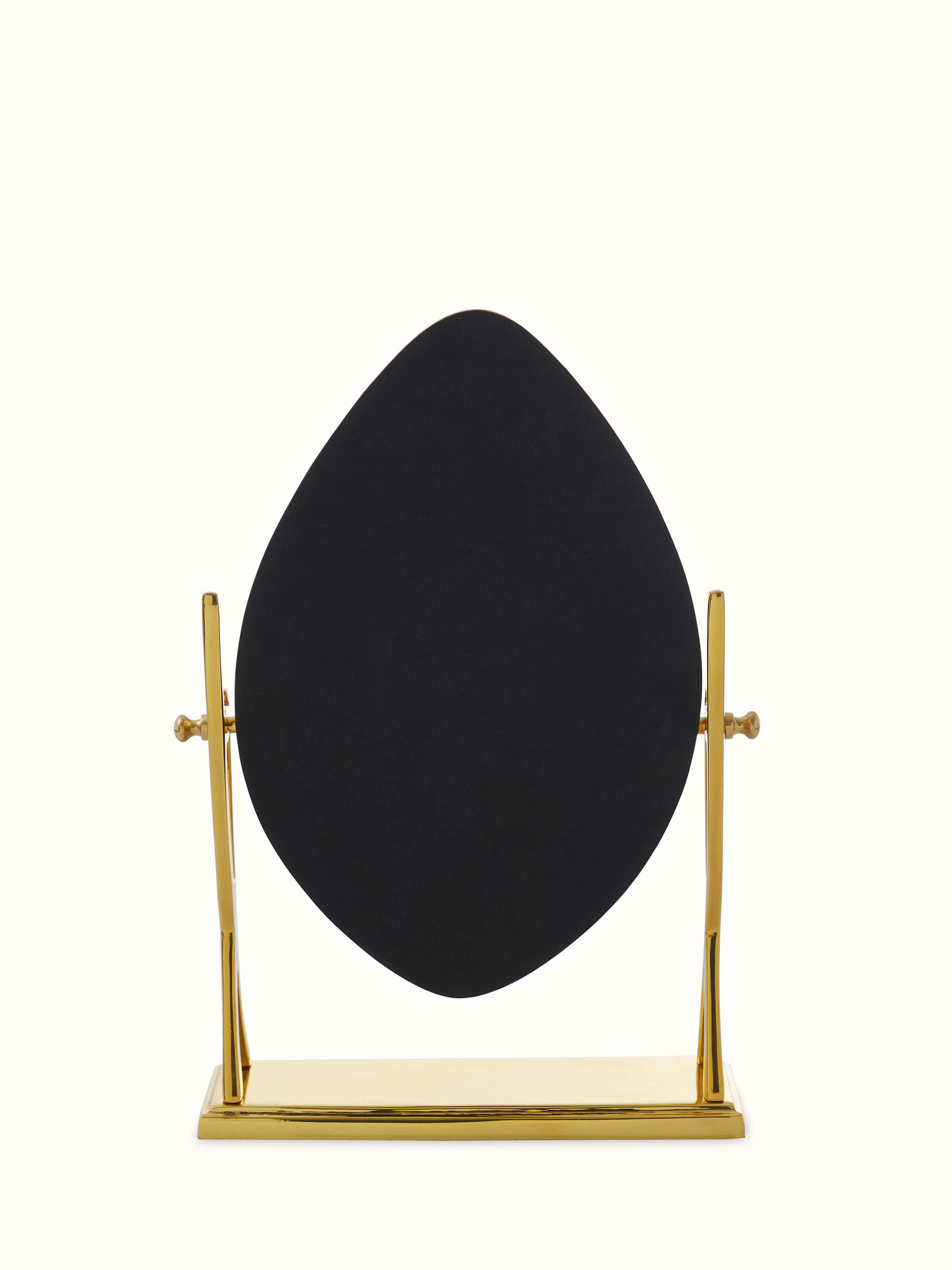 Back view of Natural Brass Table Mirror from Swadesh, showcasing its sturdy construction and intricate brass detailing.