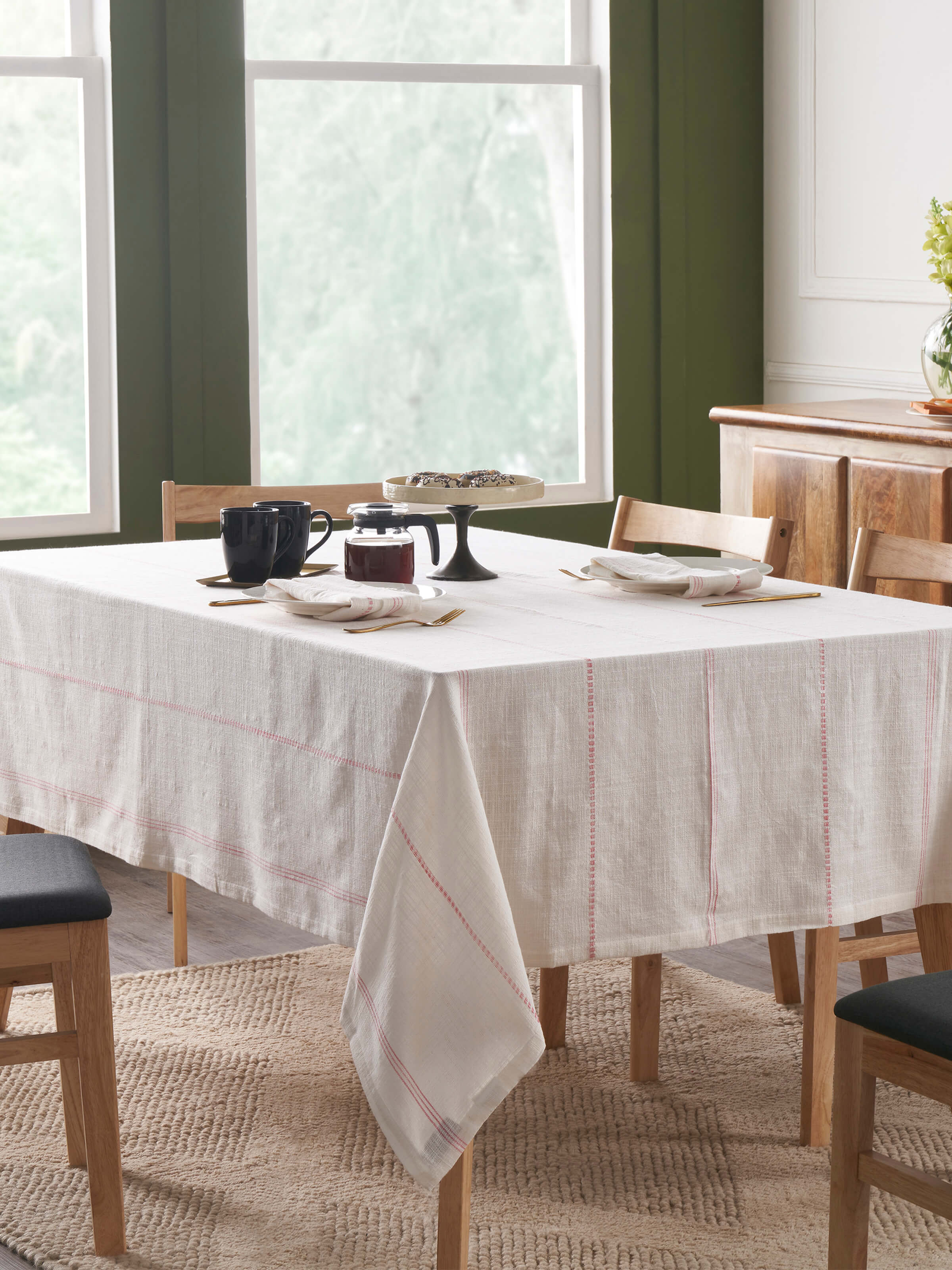 Front view capturing the table cover spread neatly across a 6-seater table