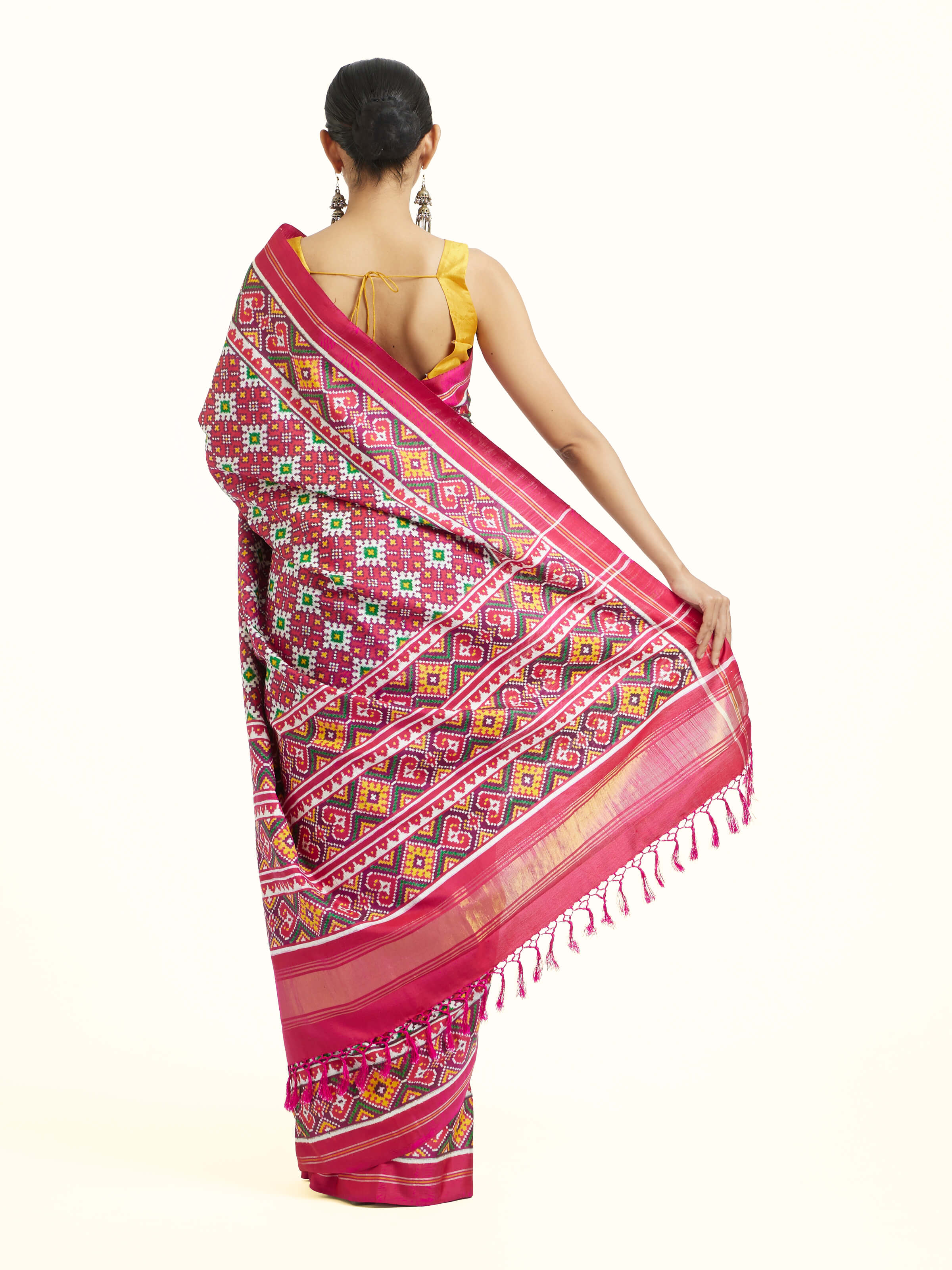 Back view of pink mulberry silk Patan Patola saree with decorative pallu design