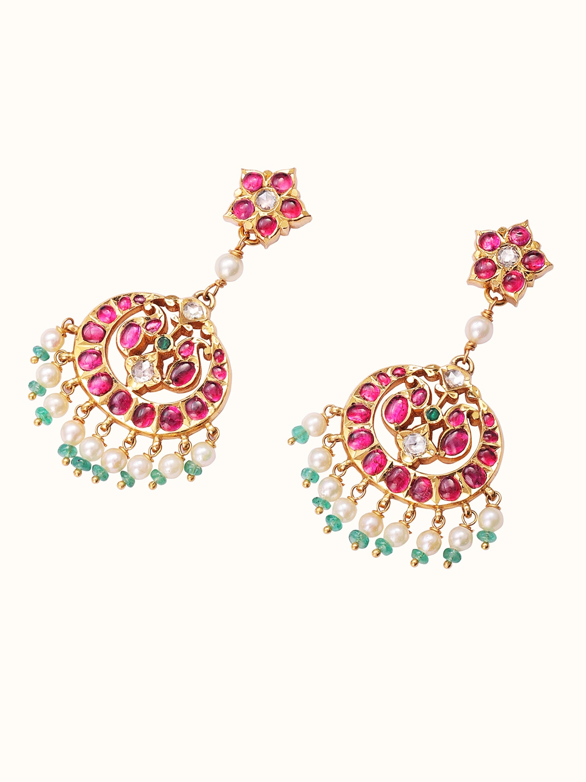 Angled view of Kundala Velai 22 karat gold drop earrings displaying their elegant gold finish