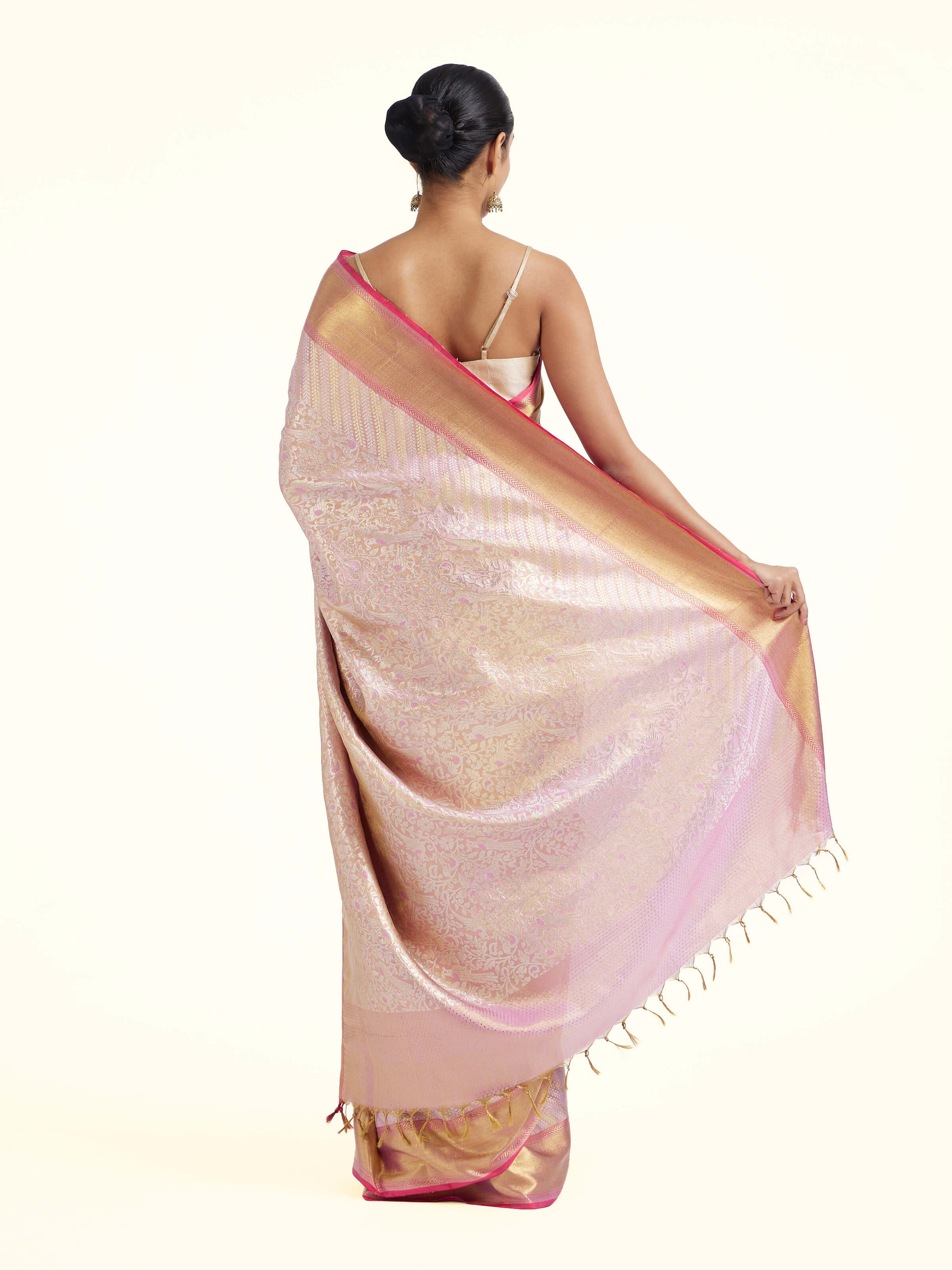 Back view of mauve silk Kancheepuram saree displaying grand pallu