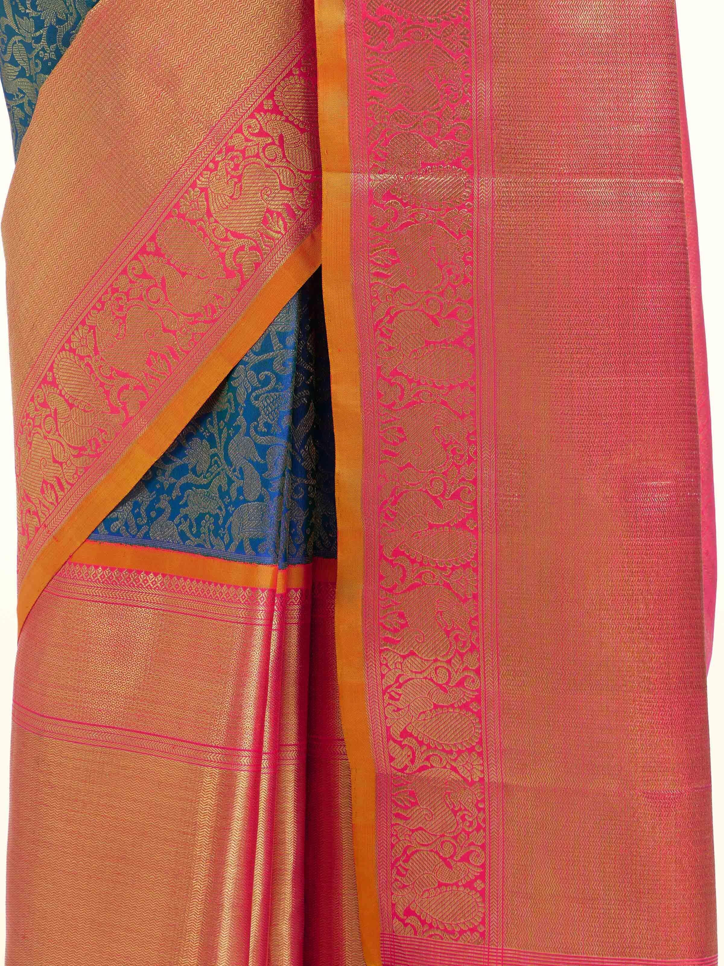 Detail view of blue silk Kancheepuram saree showing silk texture and zari craftsmanship