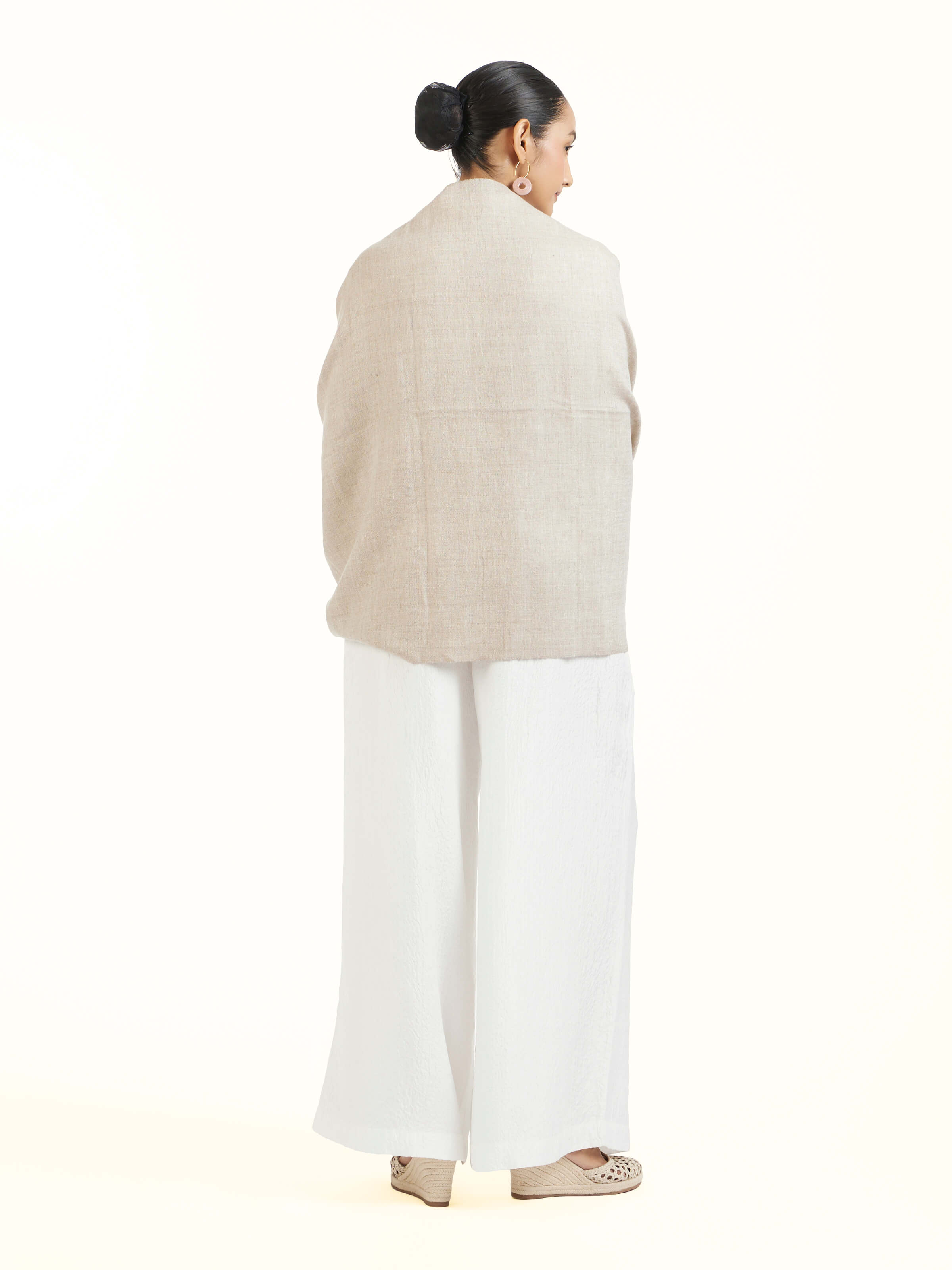 Back view of beige cashmere stole displaying full design