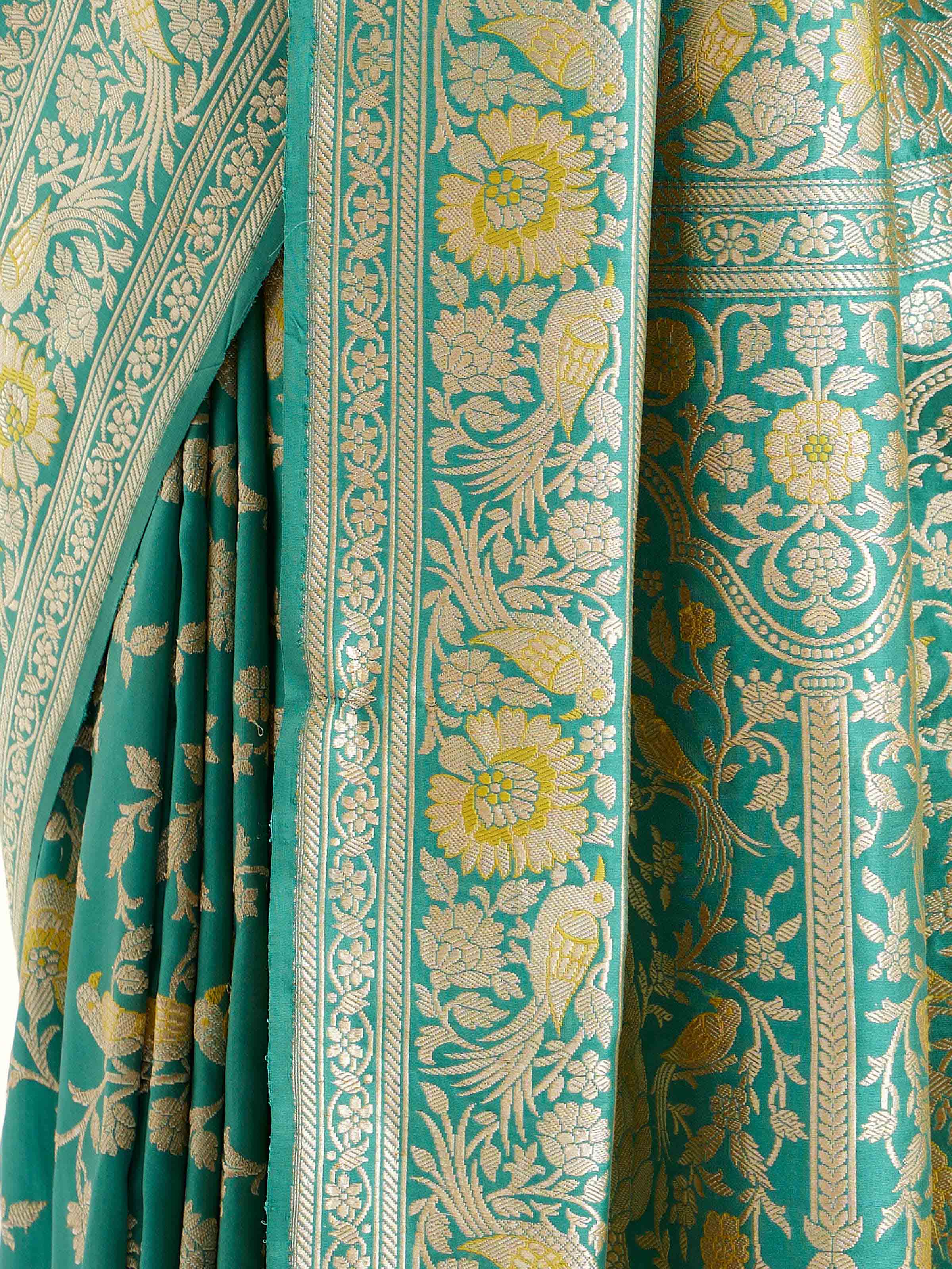 Detail view of sea blue mulberry katan silk Banarasi saree showing silk texture and zari craftsmanship