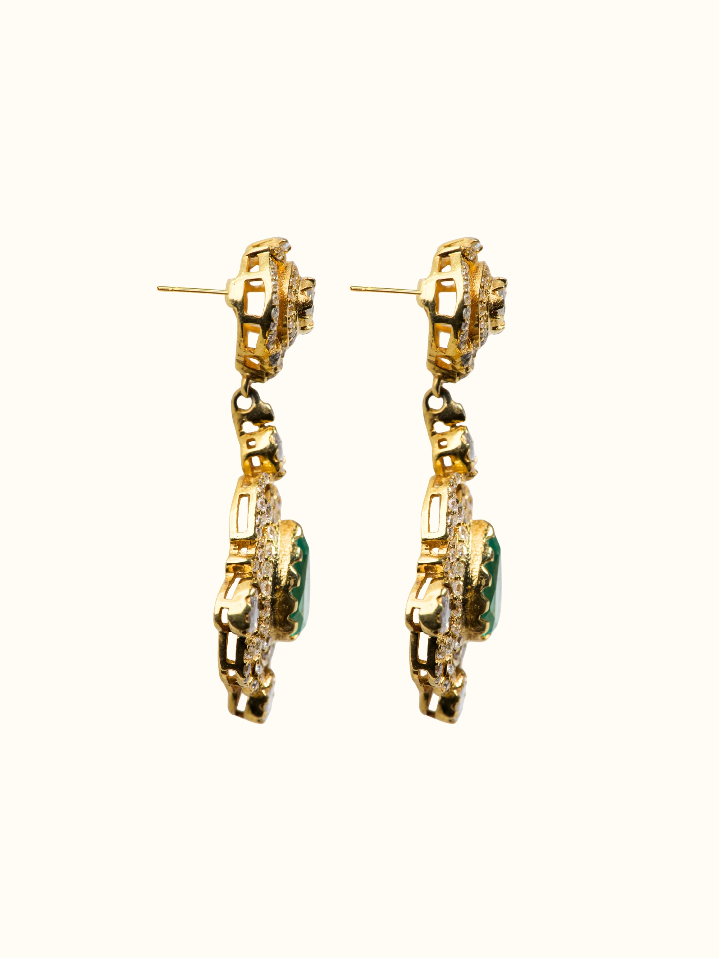 Side view of silver smithing drop earrings