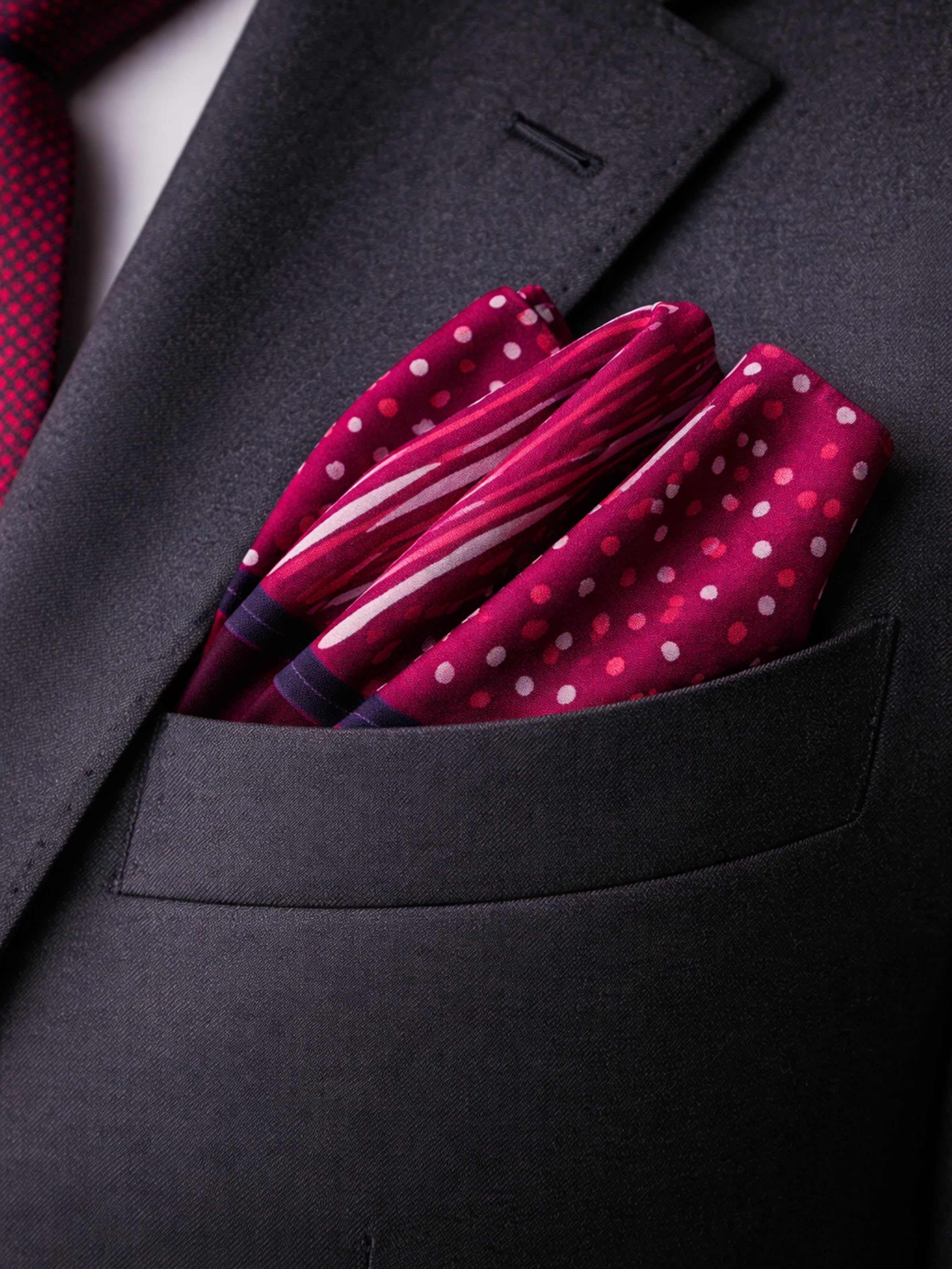 lifestyle view of assorted silk discharge block printed pocket squares set