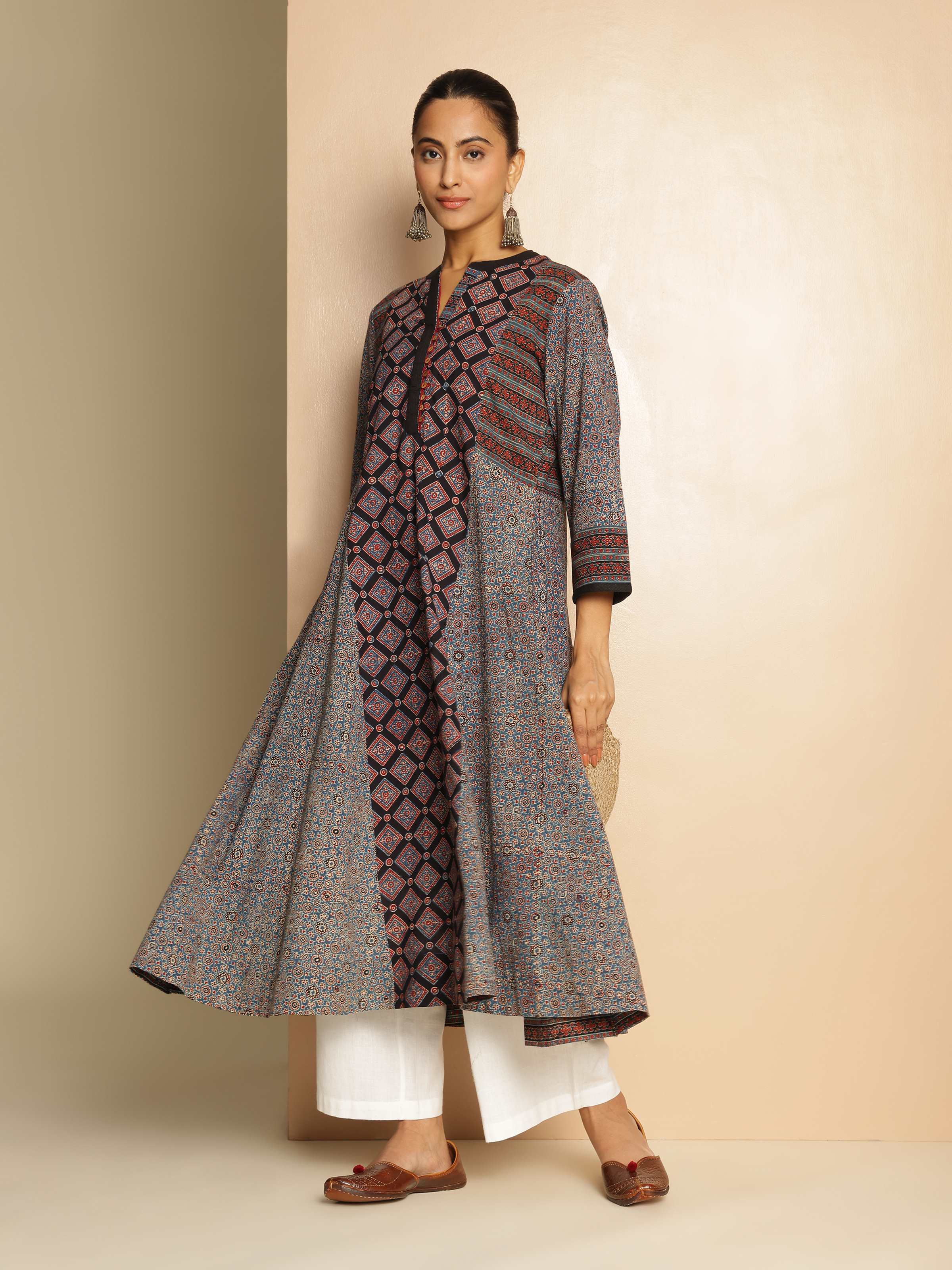 Angled view of Black Cotton Ajrakh Block Printed Flared Kurta displaying cotton fabric and detailed Ajrakh motifs