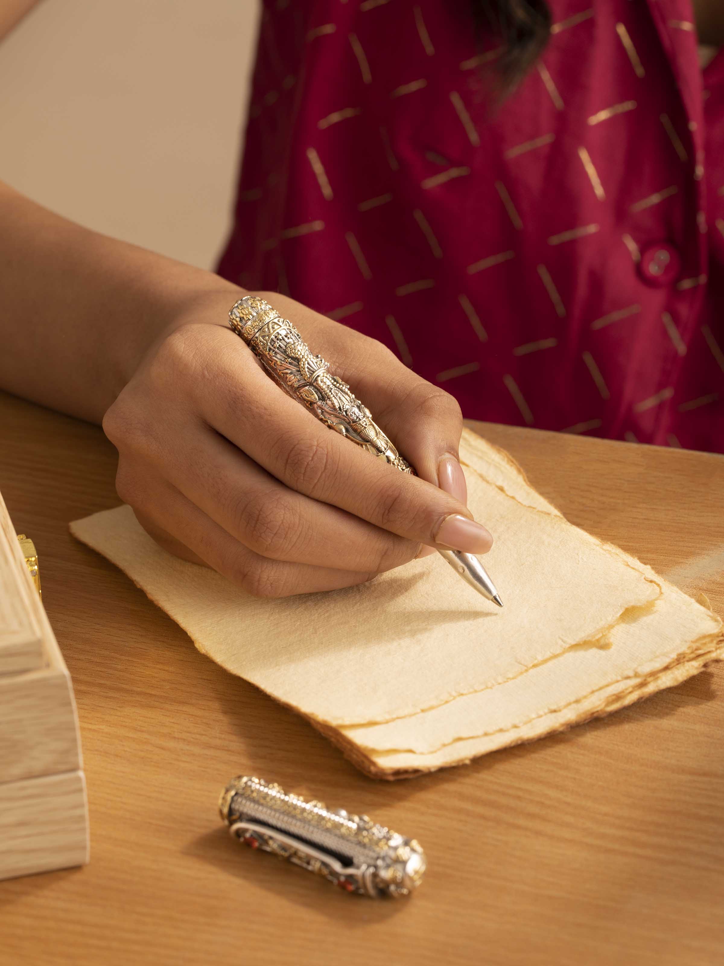 Side view of Lakshmi & Ganesha Silver Smithing Pen showcasing detailed craftsmanship by Swadesh