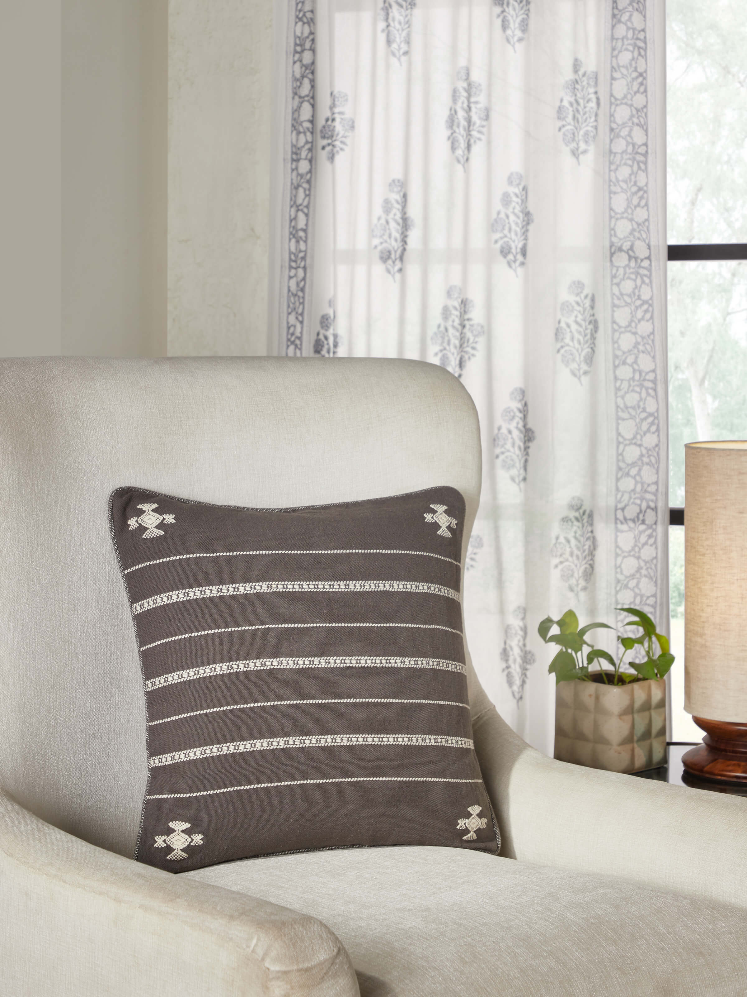 Top view showcasing the full cushion cover design and intricate cotton weave