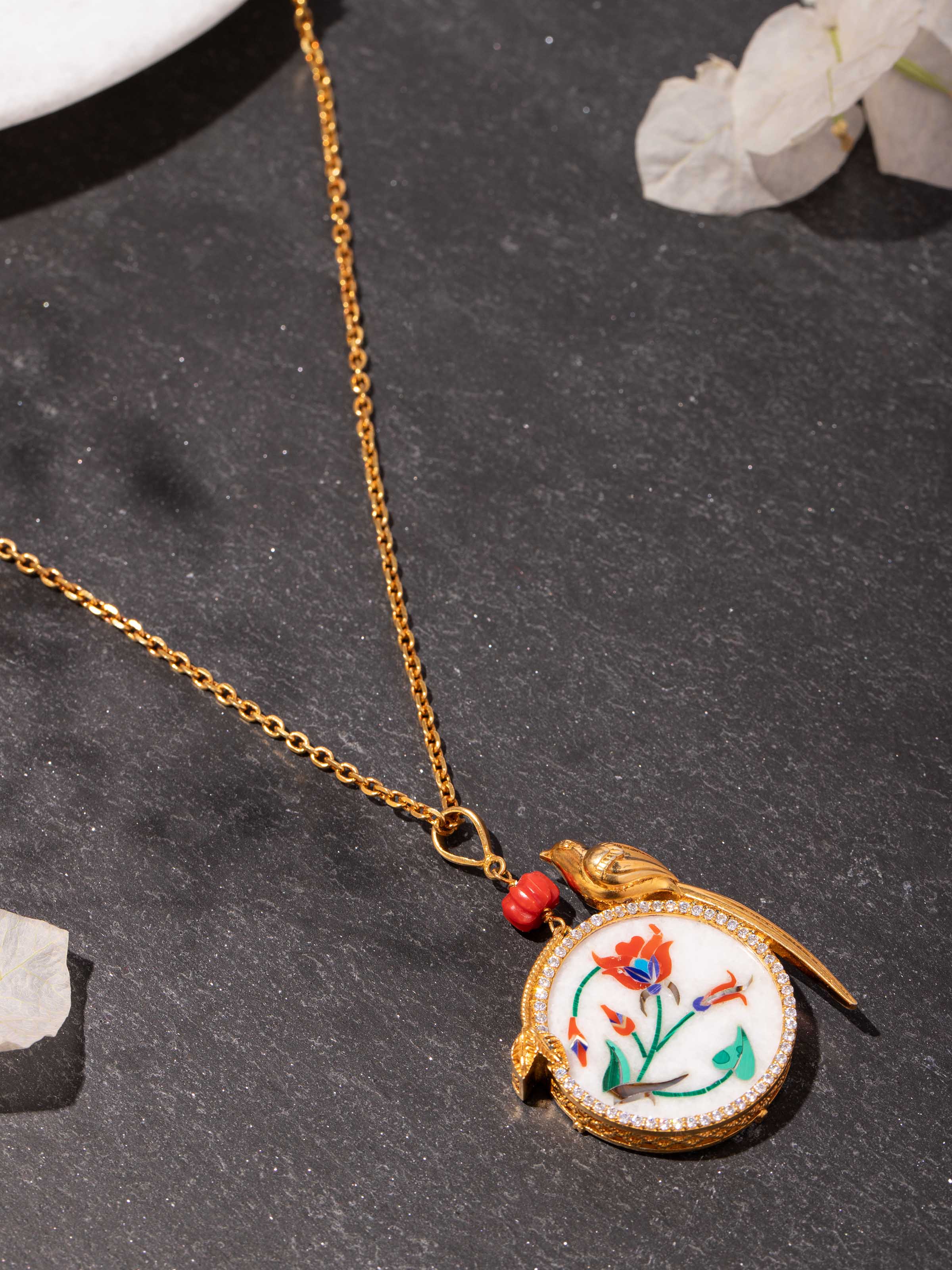 Alternate lifestyle view of Parchinkari pendant highlighting chain length and artisanal detailing.