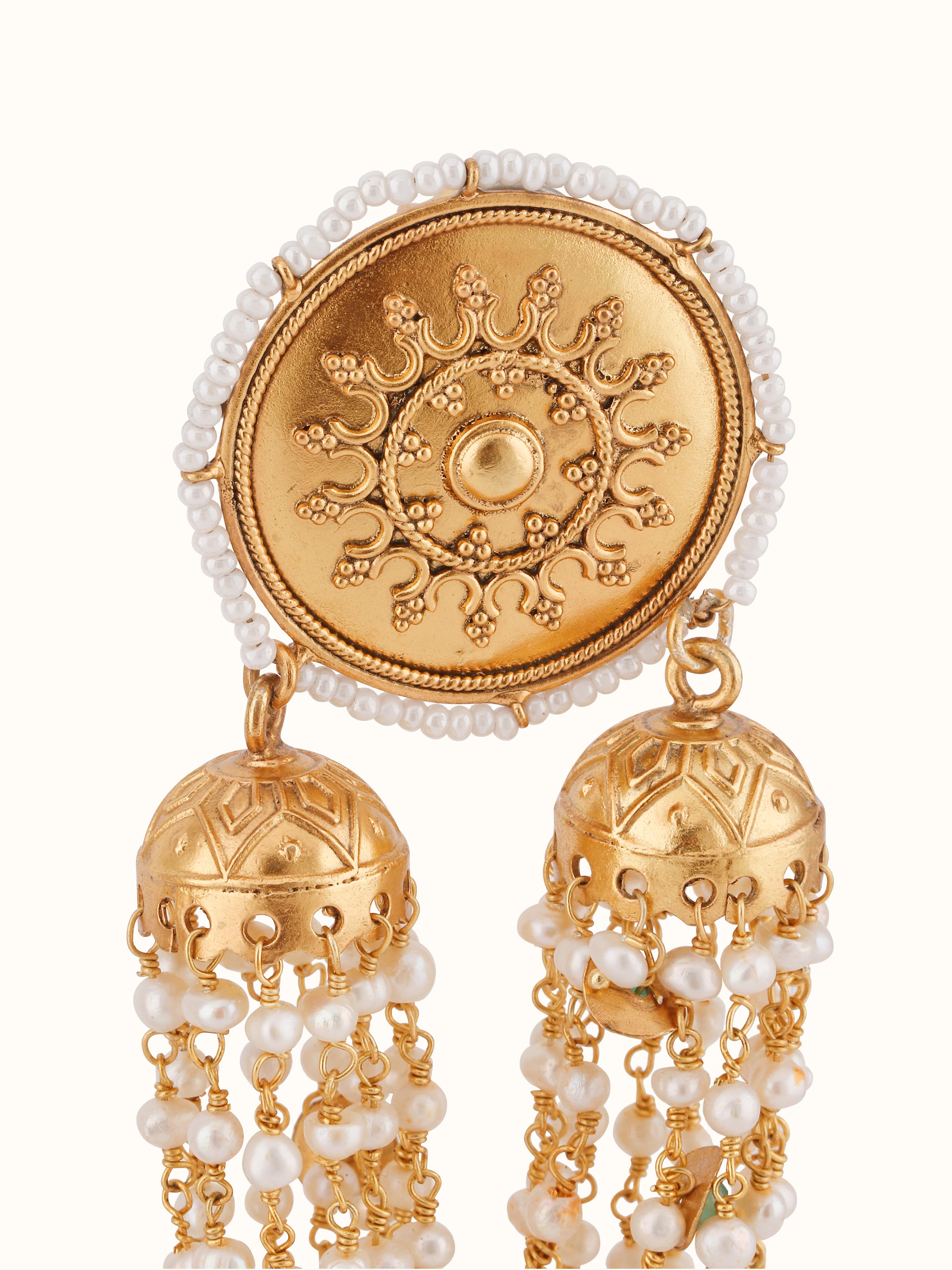 Overhead shot highlighting the earrings’ shape and shine