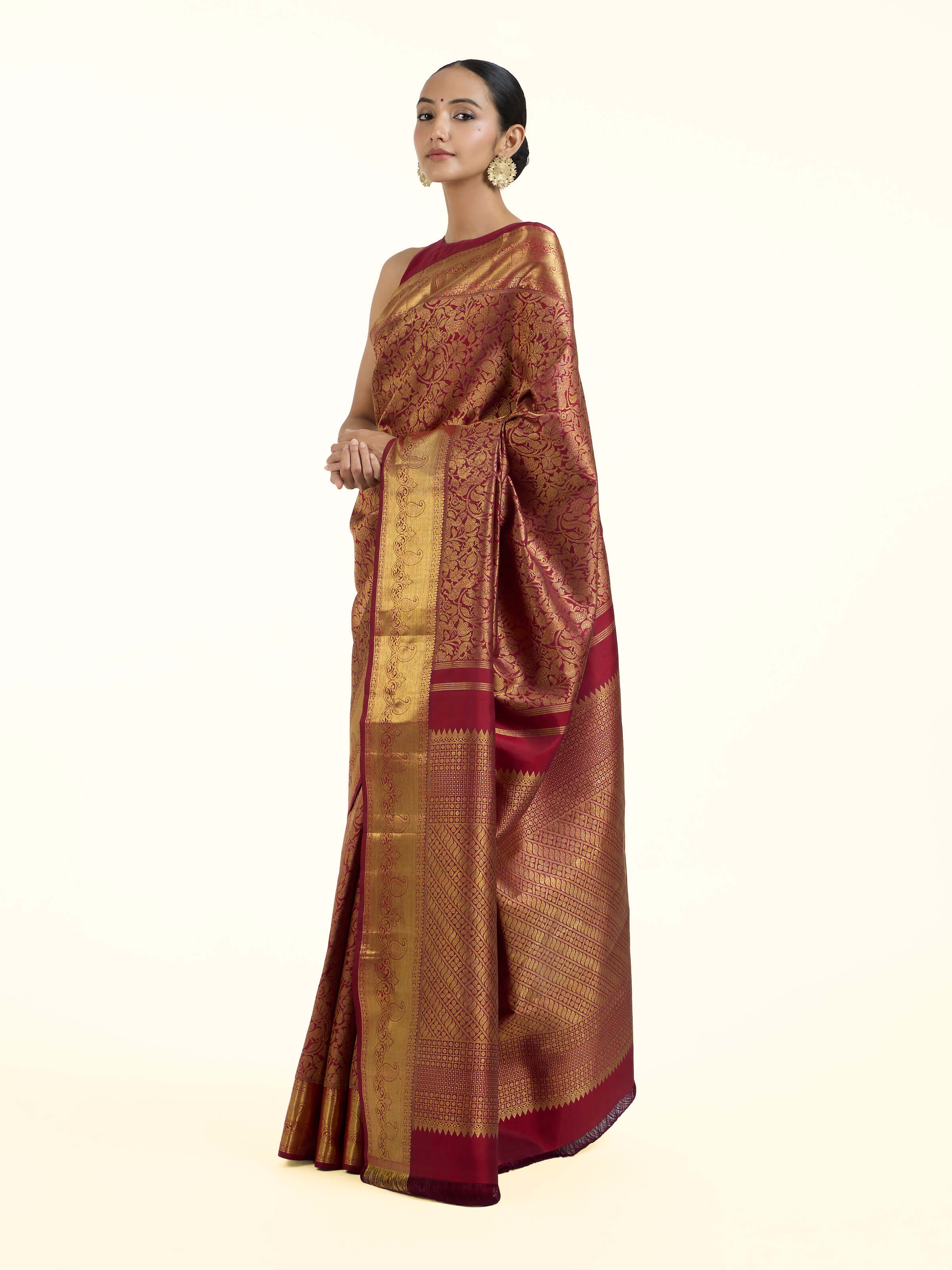 Side view of light pink silk Kancheepuram saree showcasing silk sheen