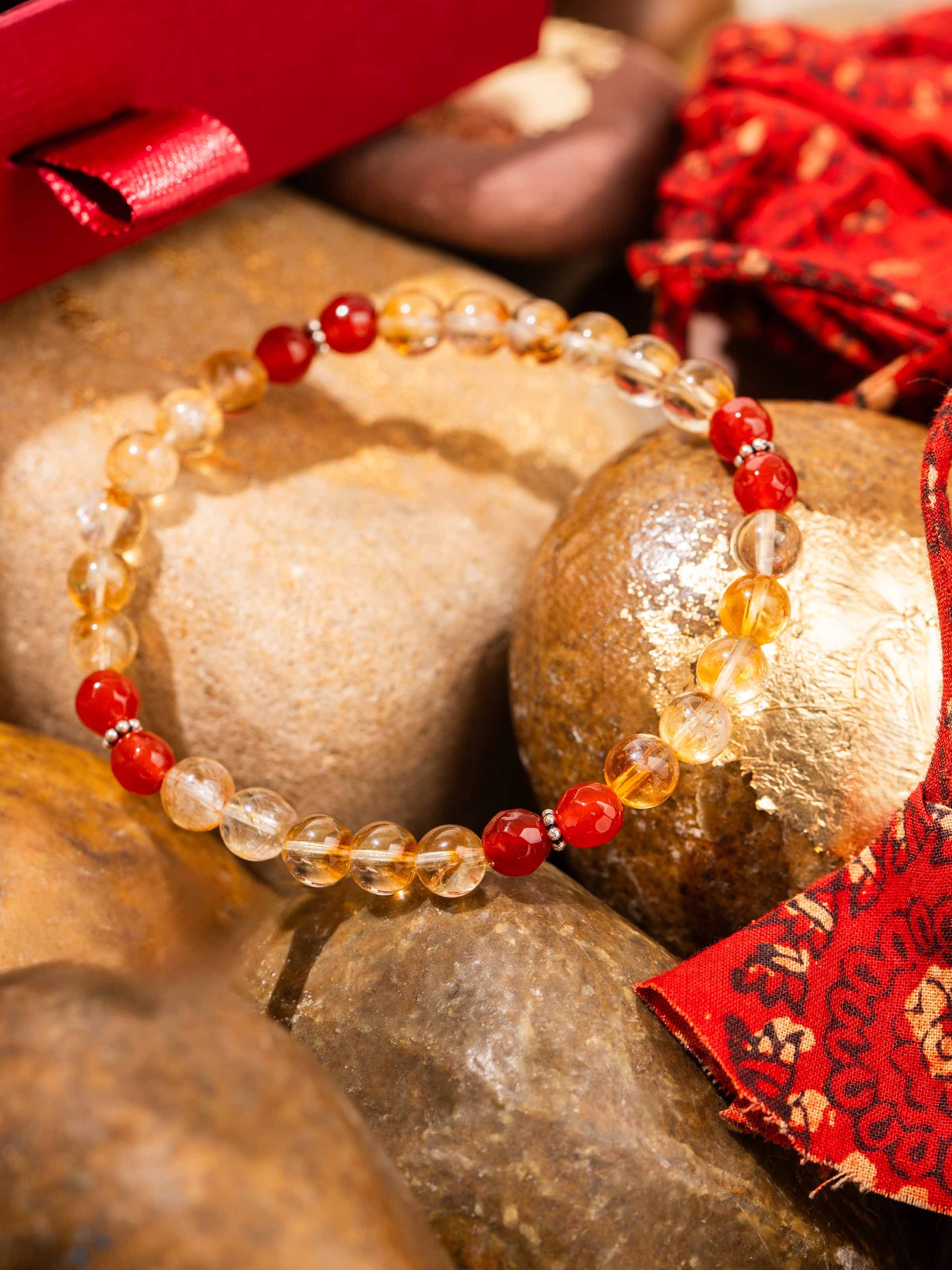 Side view of Carnelian, Citrine Bracelet displaying stone clarity and handcrafted link detail