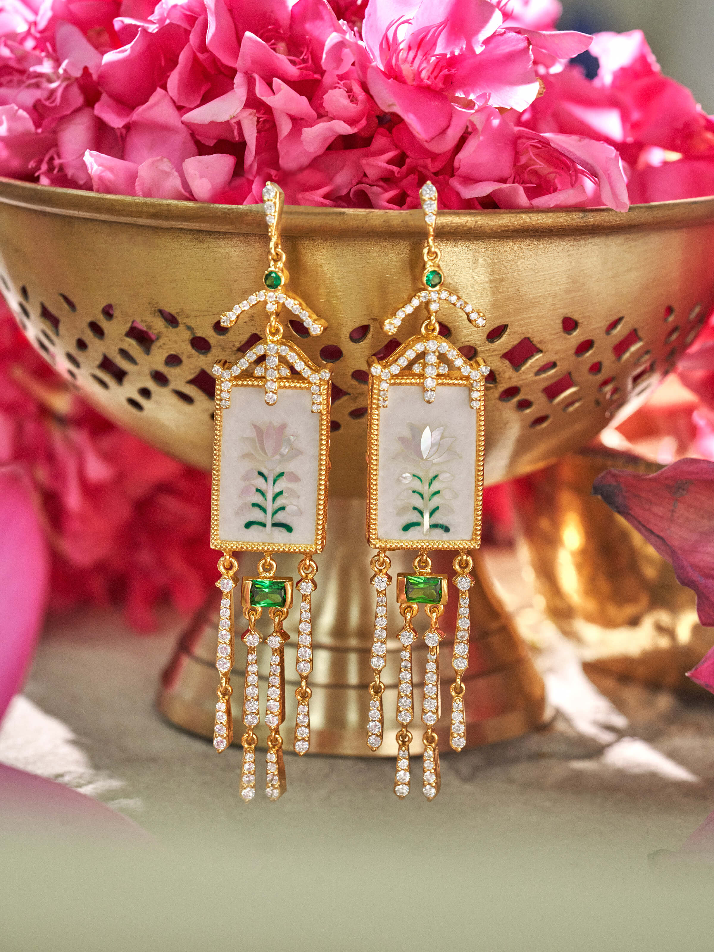 Close-up shot capturing the earrings’ delicate patterns.