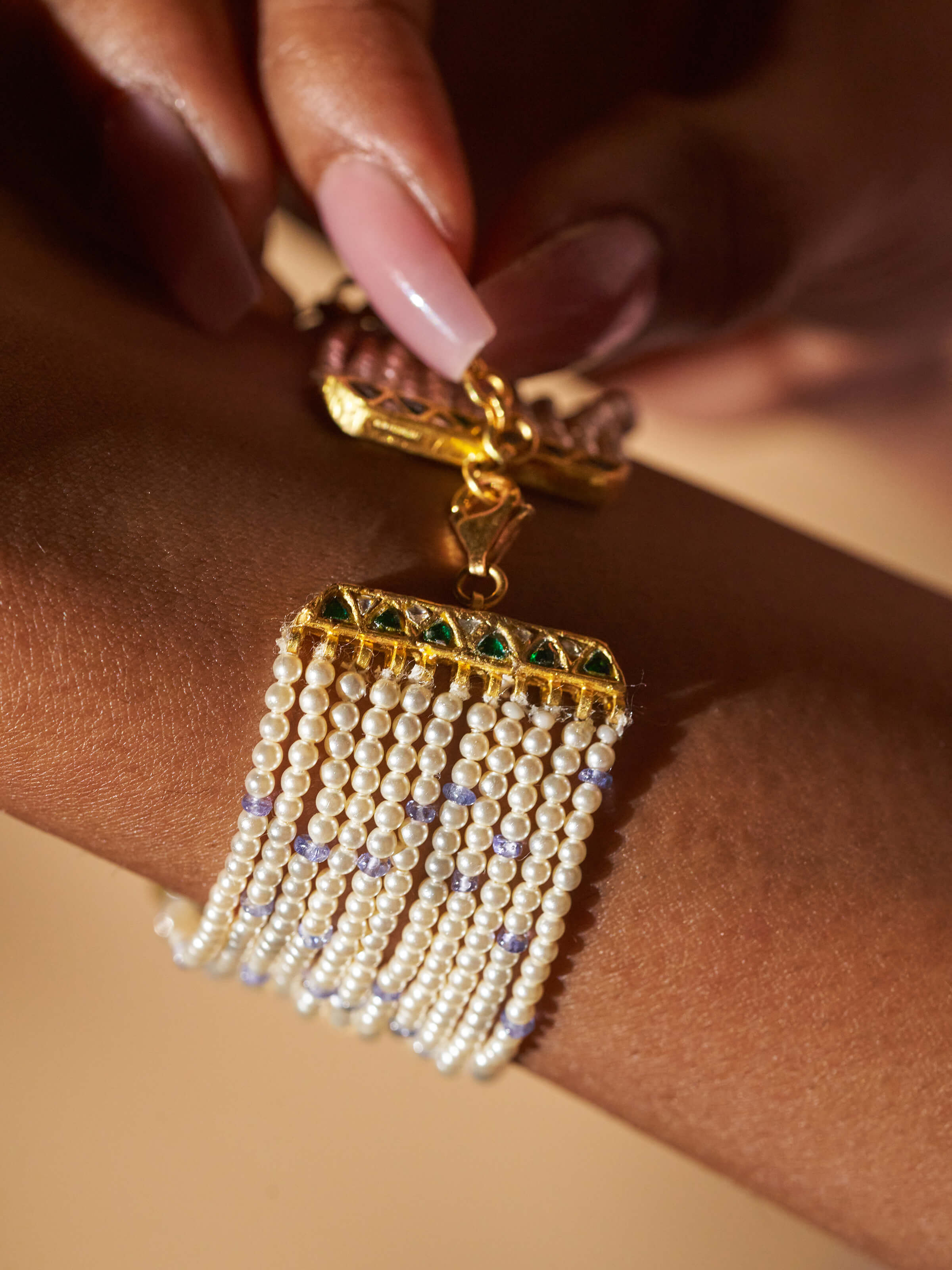 Side view revealing the bracelet’s polished surface and contours