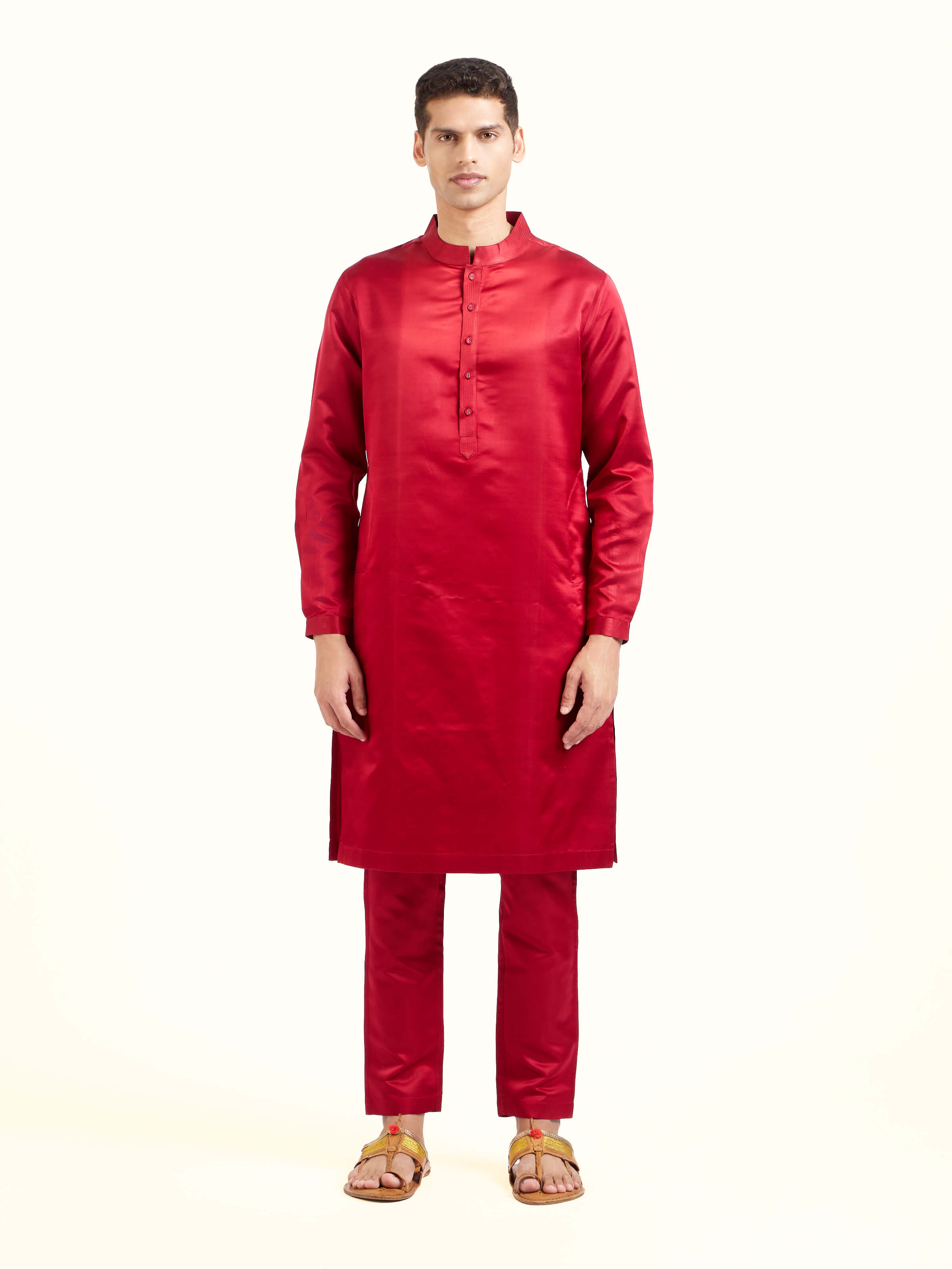 Front view of maroon katan silk Banarasi long kurta churidar set with rich woven motifs