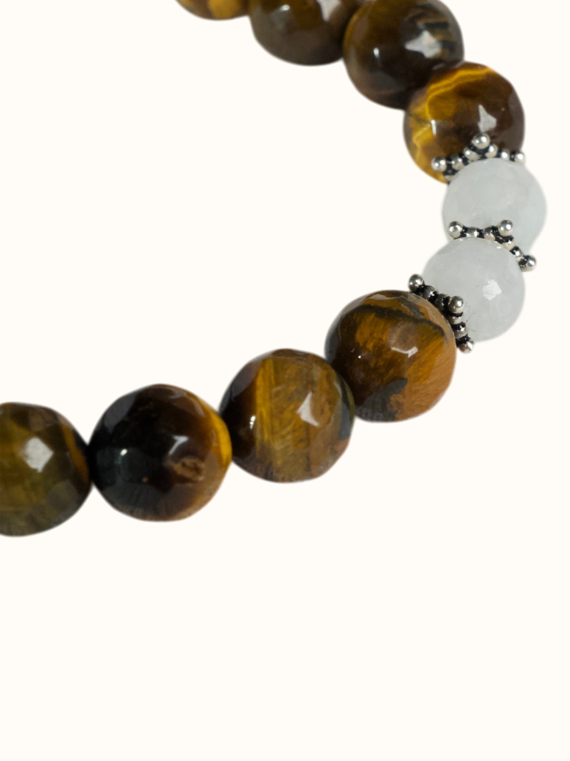 Side-angle view of the White Moonstone & Tiger Eye Silver Bracelet