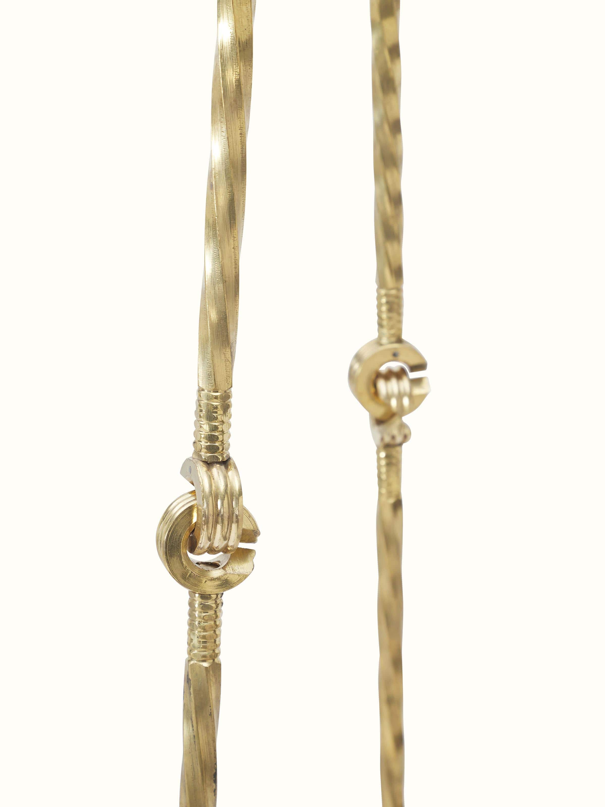 Artistic view of the Sheesham wood and cane swing, showing the overall design and craftsmanship