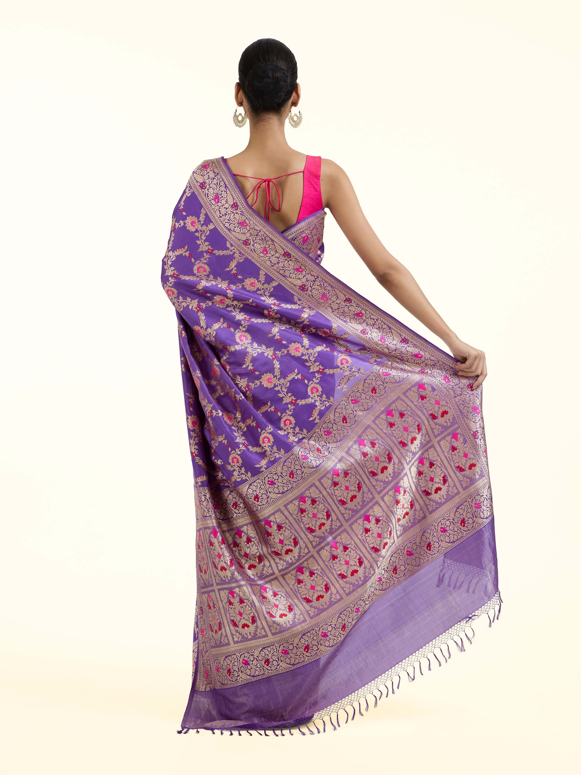 Back view of purple mulberry katan silk Banarasi saree displaying grand pallu