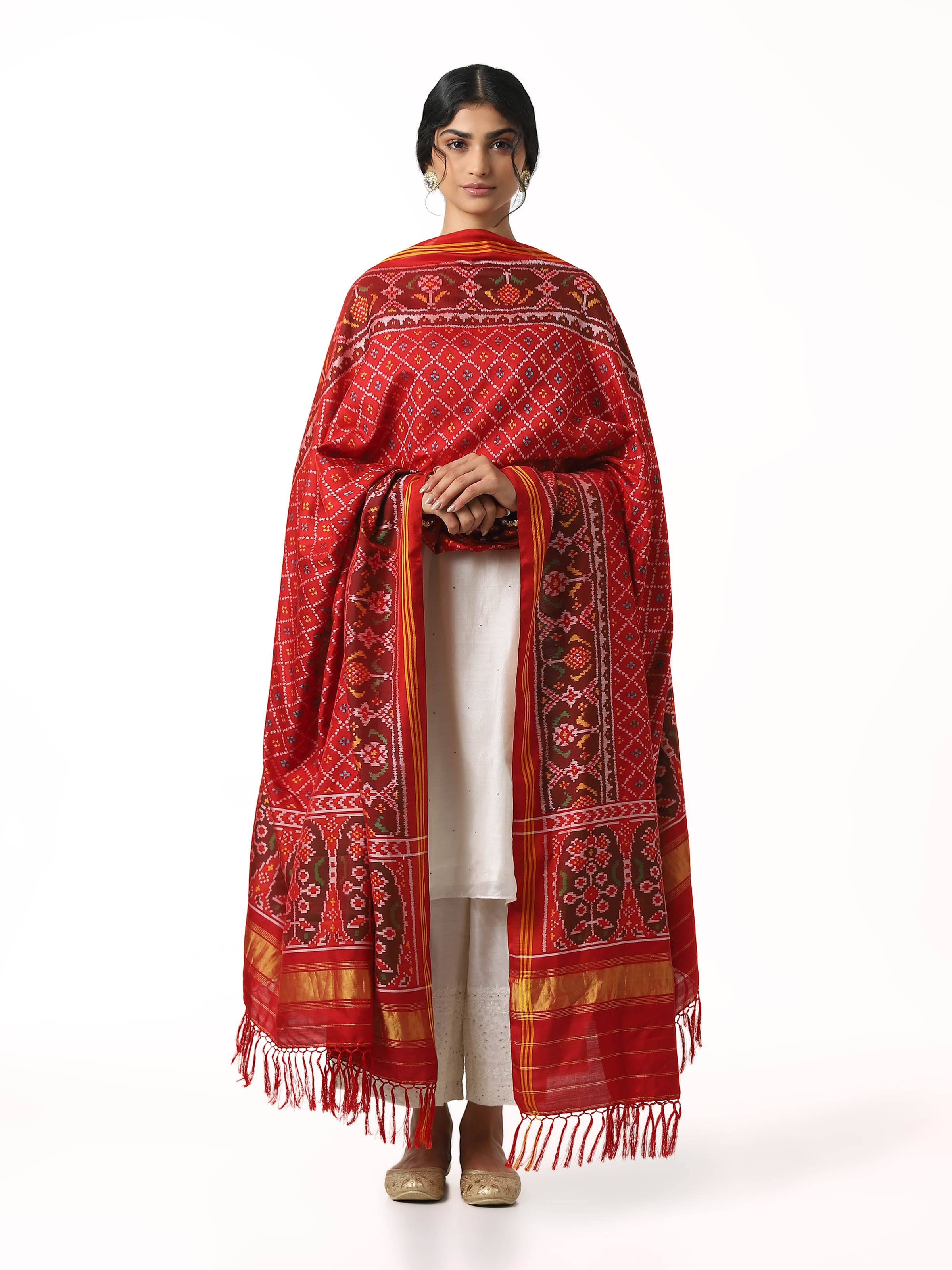 Front view of red silk semi ikat Patola dupatta showcasing traditional geometric patterns