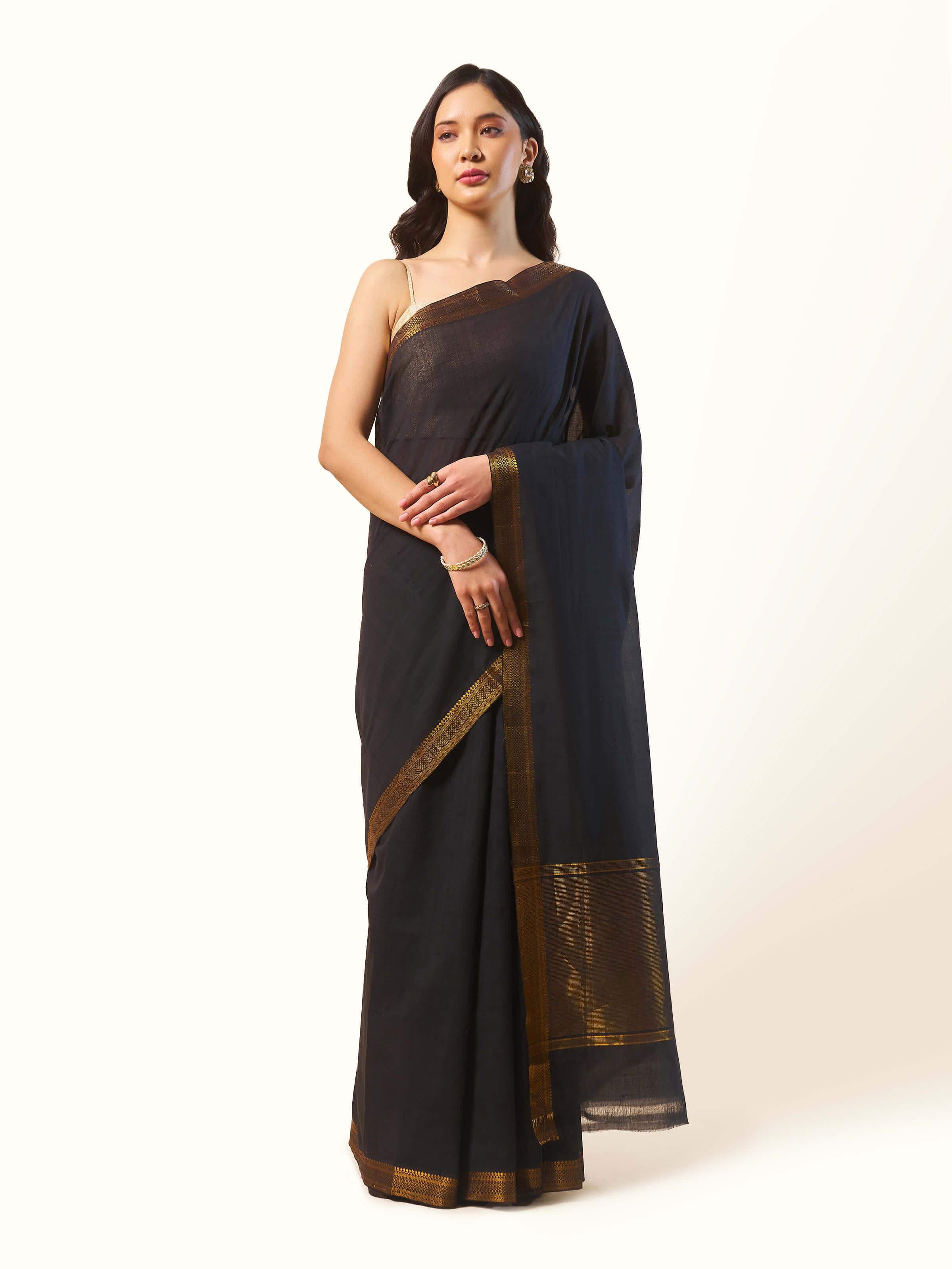 Front view of Black cotton Mangalgiri saree showcasing fabric texture