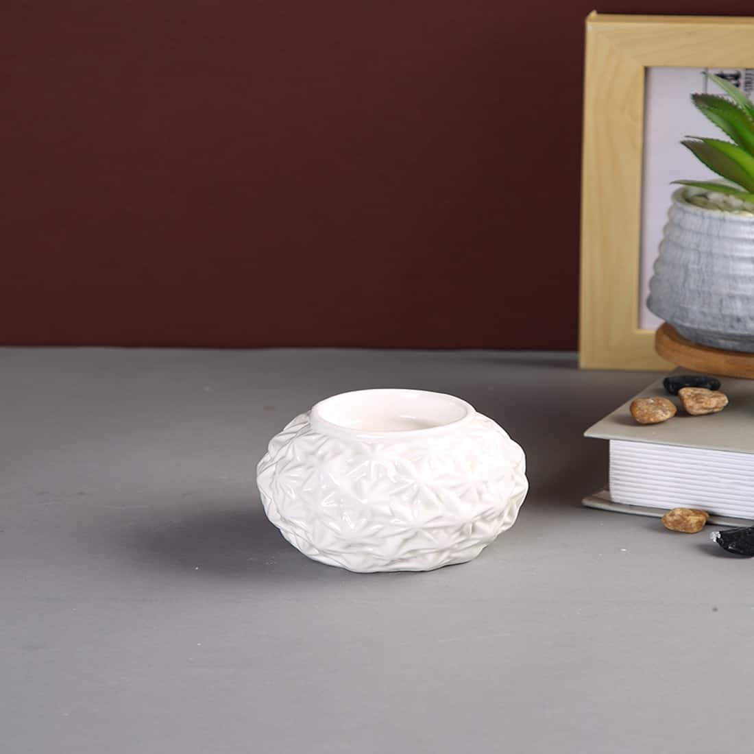 White Engraved Artisan Candle Holders in White Colour