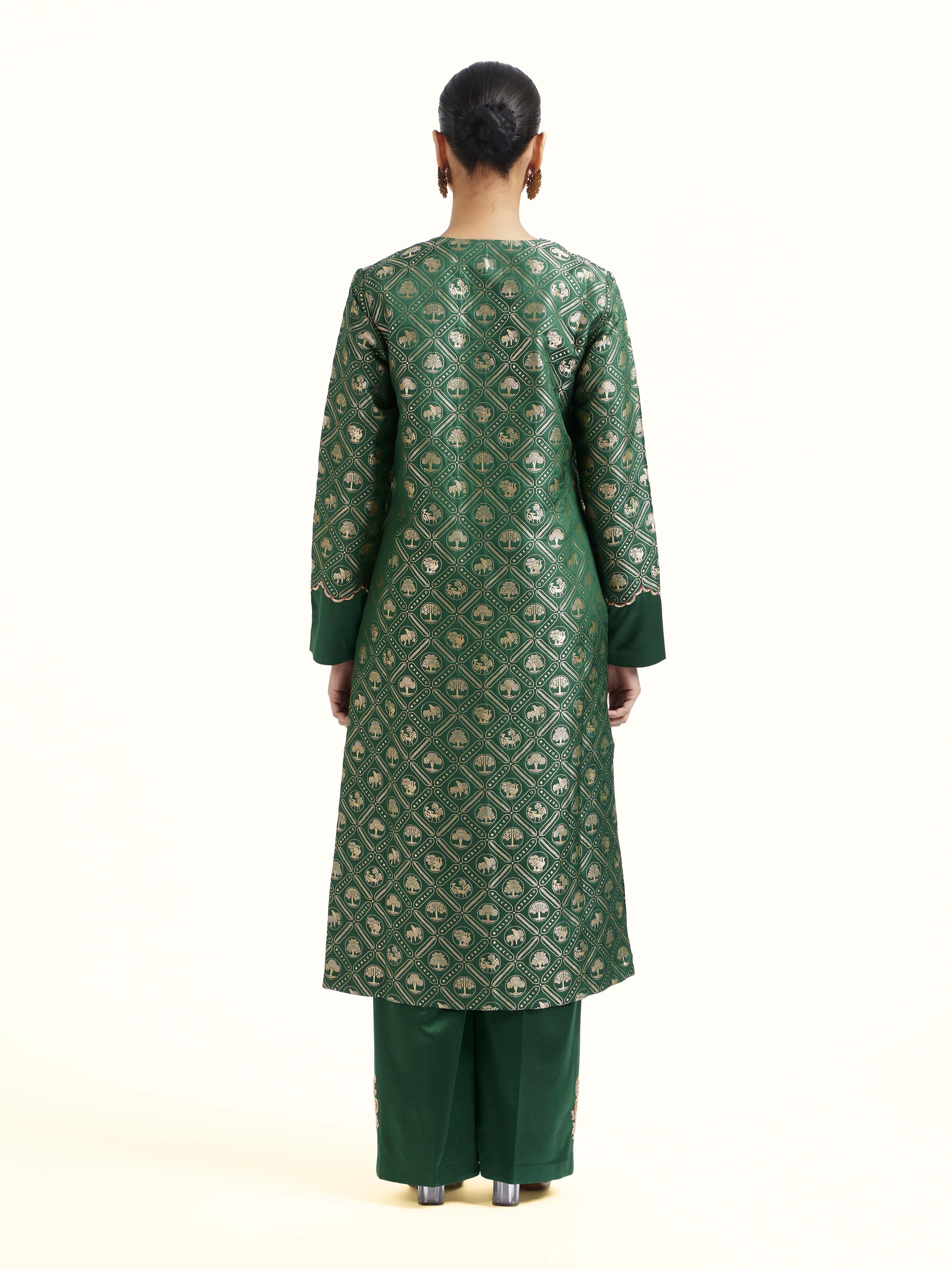 Back view of emerald green Banarasi kurta set displaying overall design
