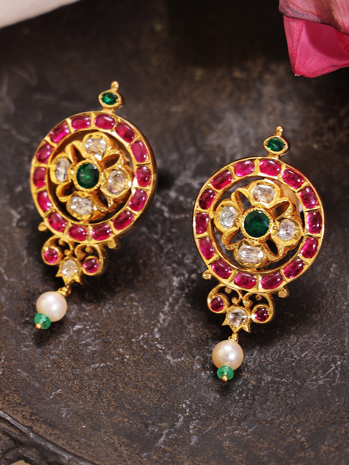 Side view of Kundala Velai 22 Karat Gold Drop Earrings highlighting their elegant gold craftsmanship and drop design.