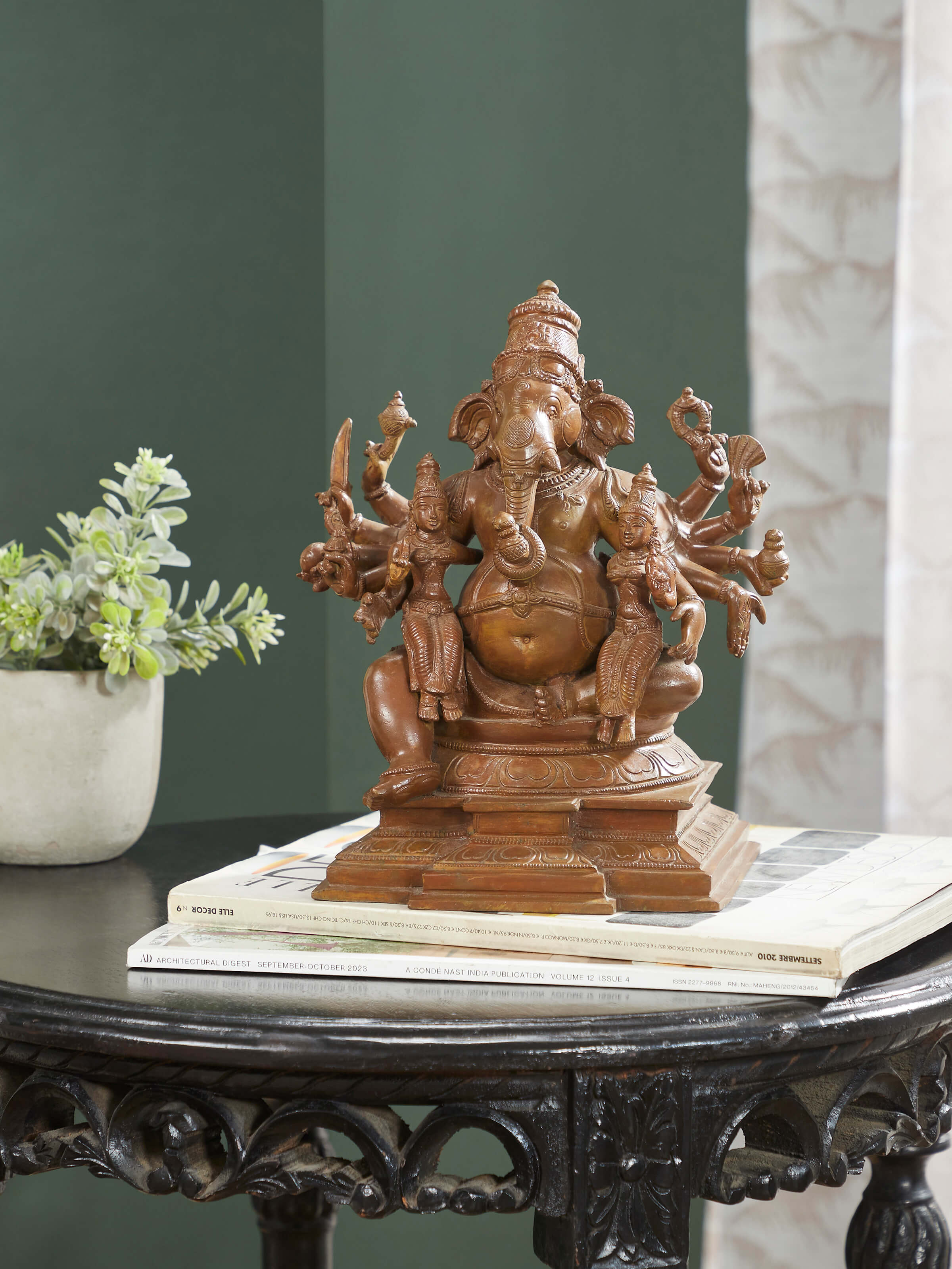 Side view of Spectacular Bronze Casting Ganesha with Siddhi Buddhi Idol by Swadesh highlighting the artistic design and bronze finish.