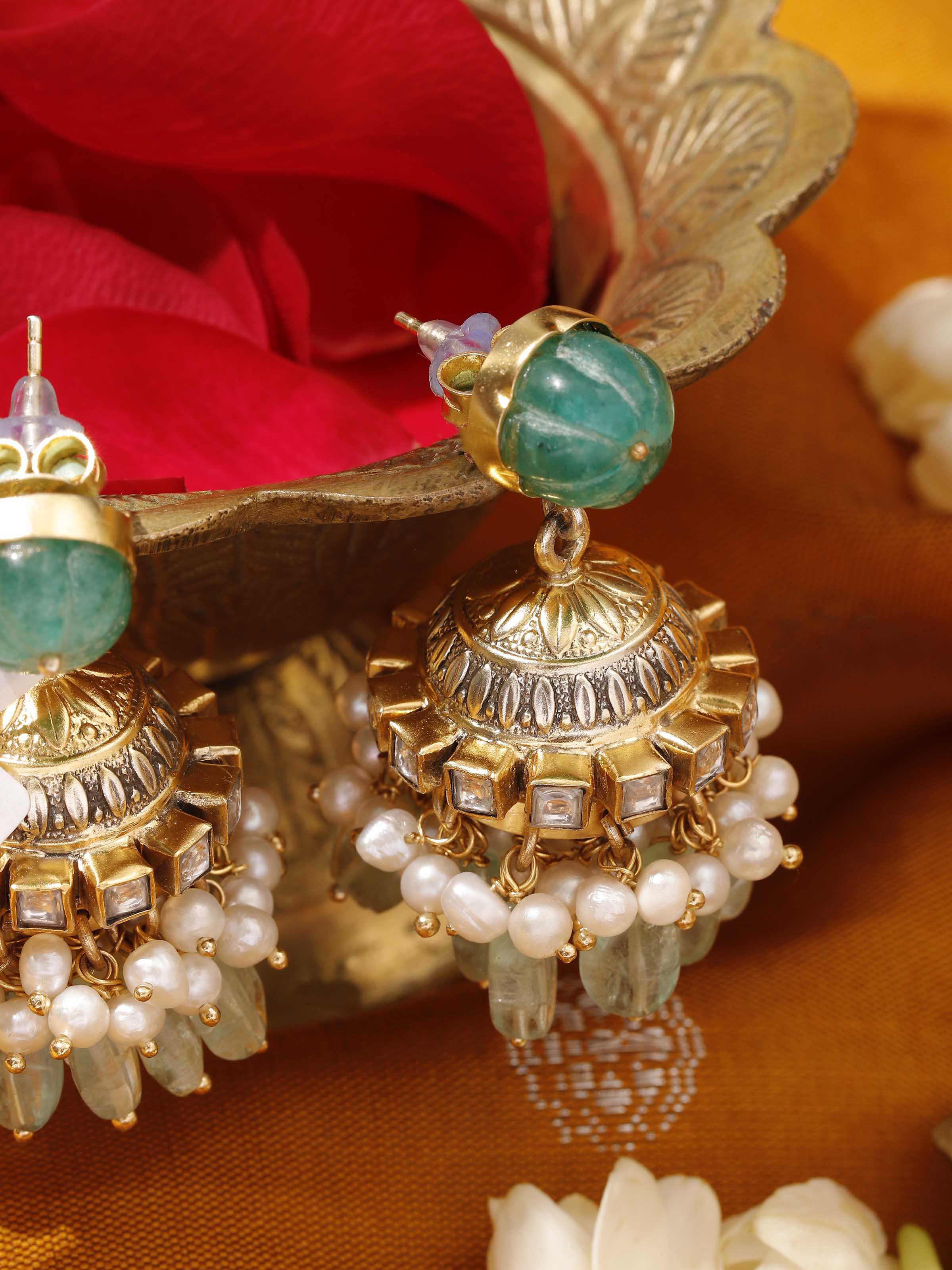 Alternate lifestyle view of Silver Smithing jhumkas paired with festive wear, highlighting cultural elegance.