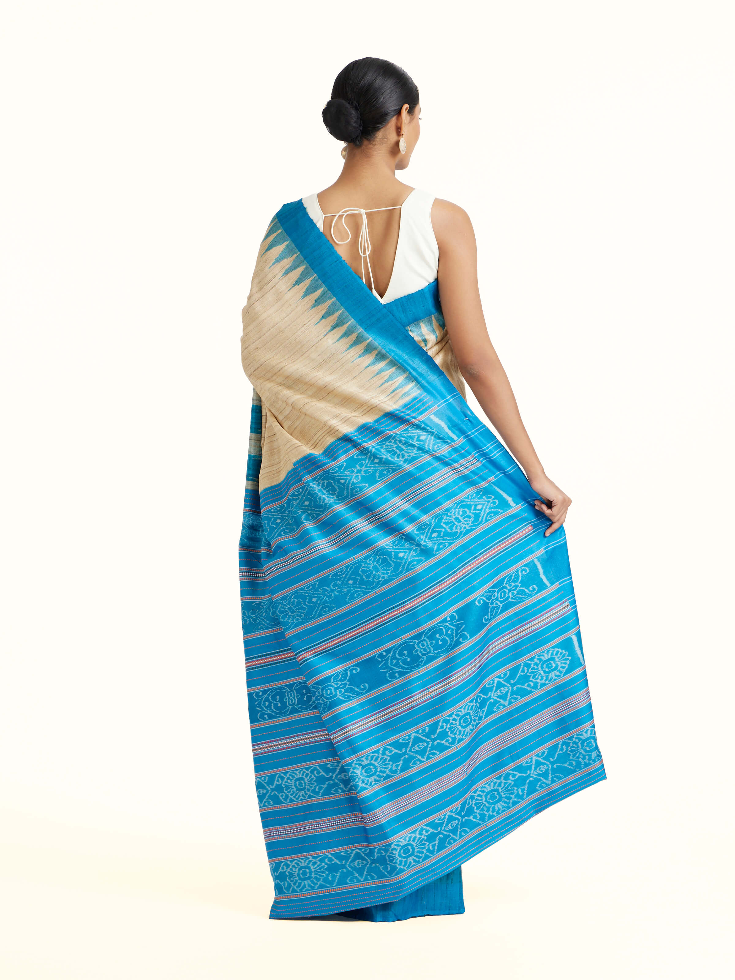 Back view of the Turquoise Tussar Ghicha Silk Bandha Ikat Saree