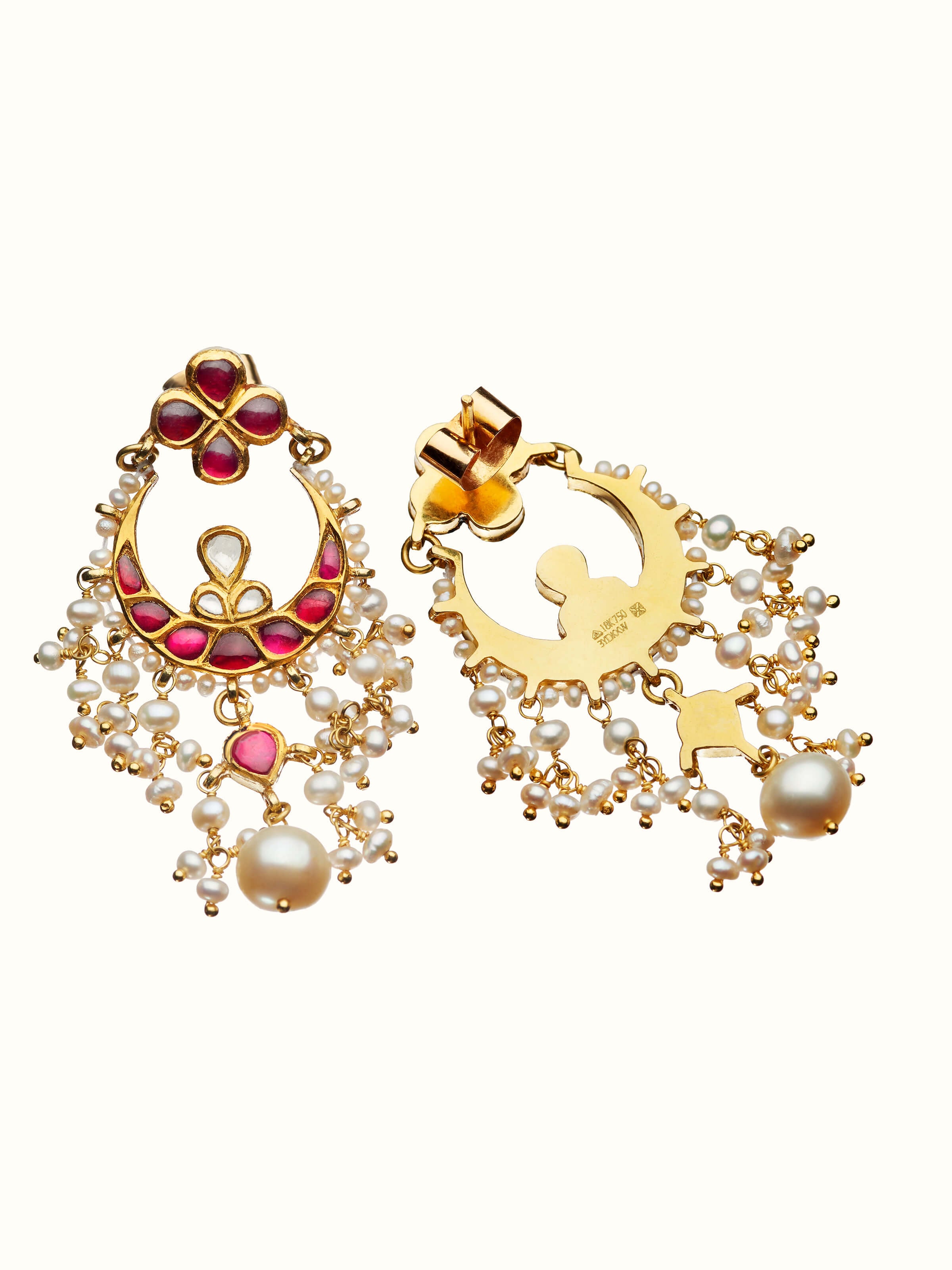 back view of jadau 18 karat gold drops