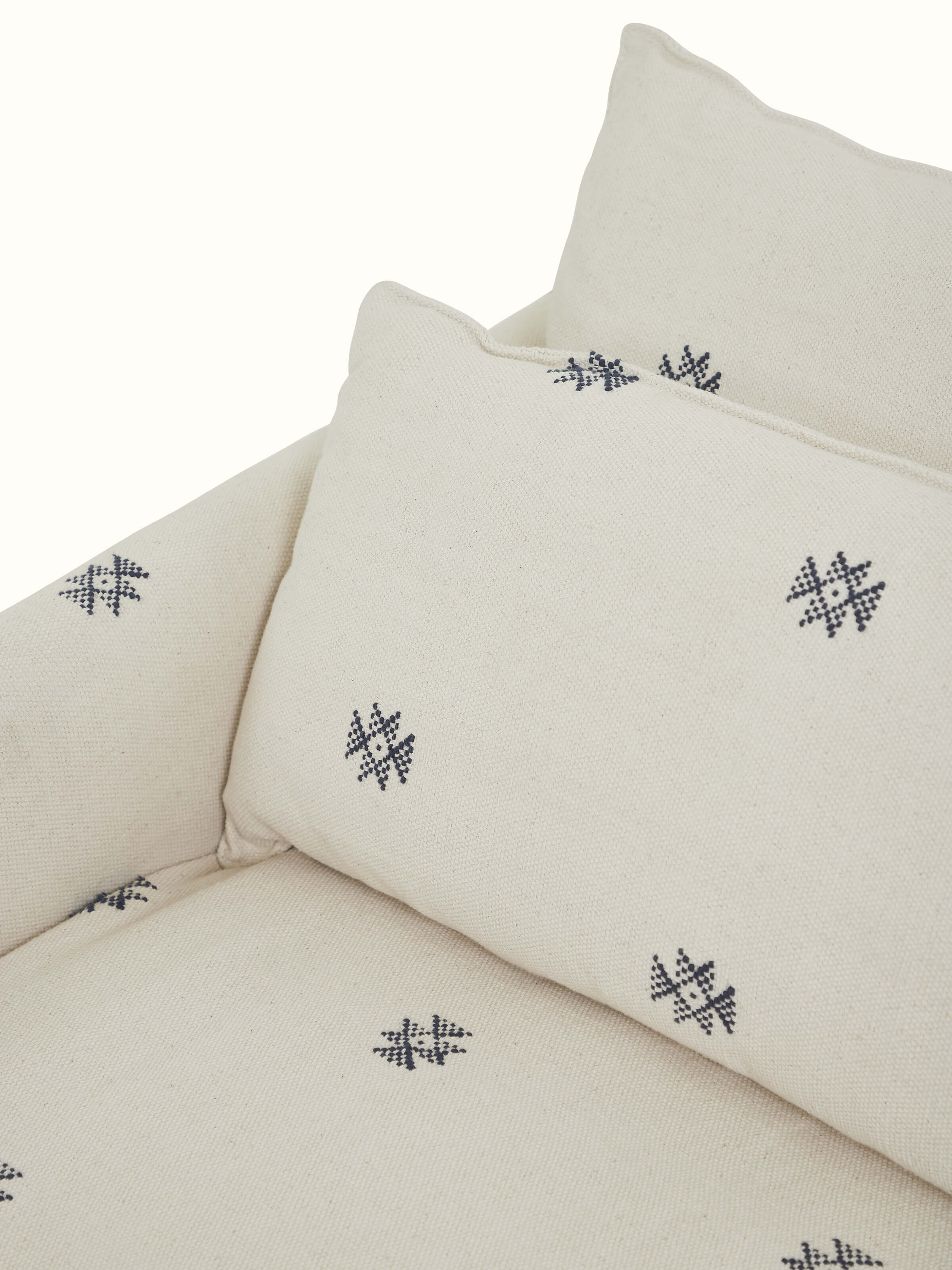 Detailed view of Upholstered Metal Lounge Chair displaying the fine upholstery and metal frame structure.