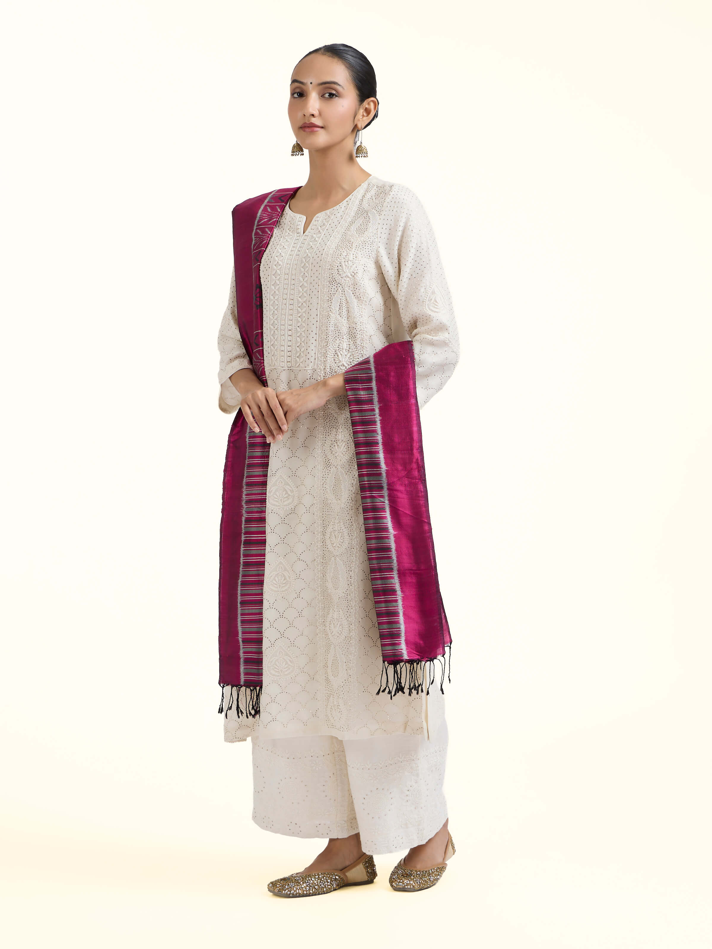 Side view of pink silk Odisha ikat dupatta showcasing handwoven texture