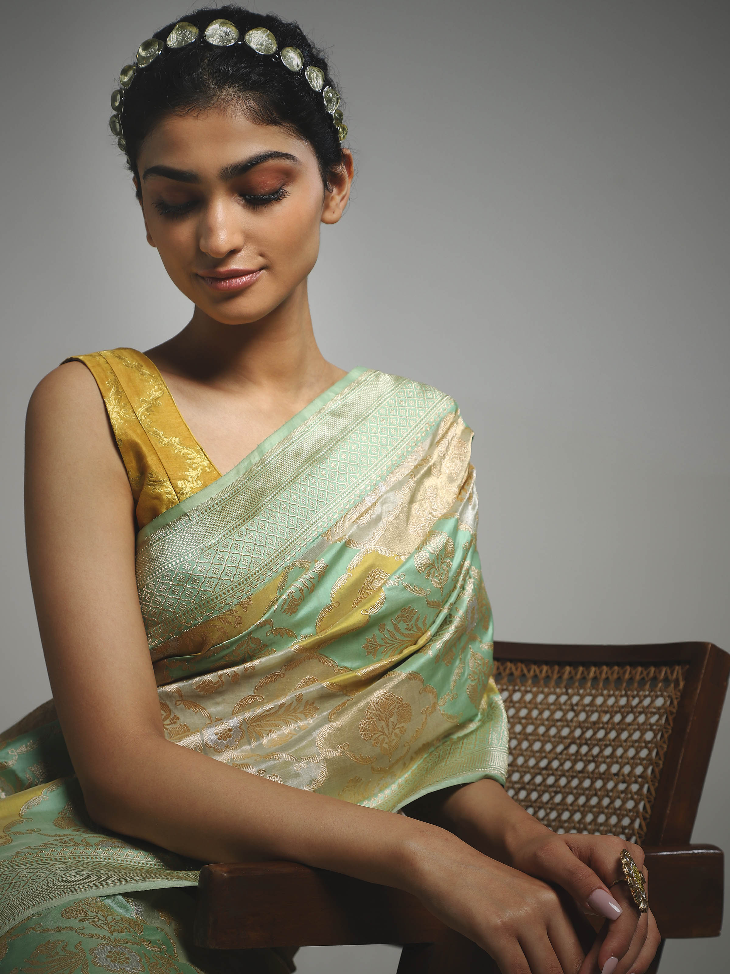 Detailed side view of silk rangkat Banarasi saree showcasing intricate craftsmanship