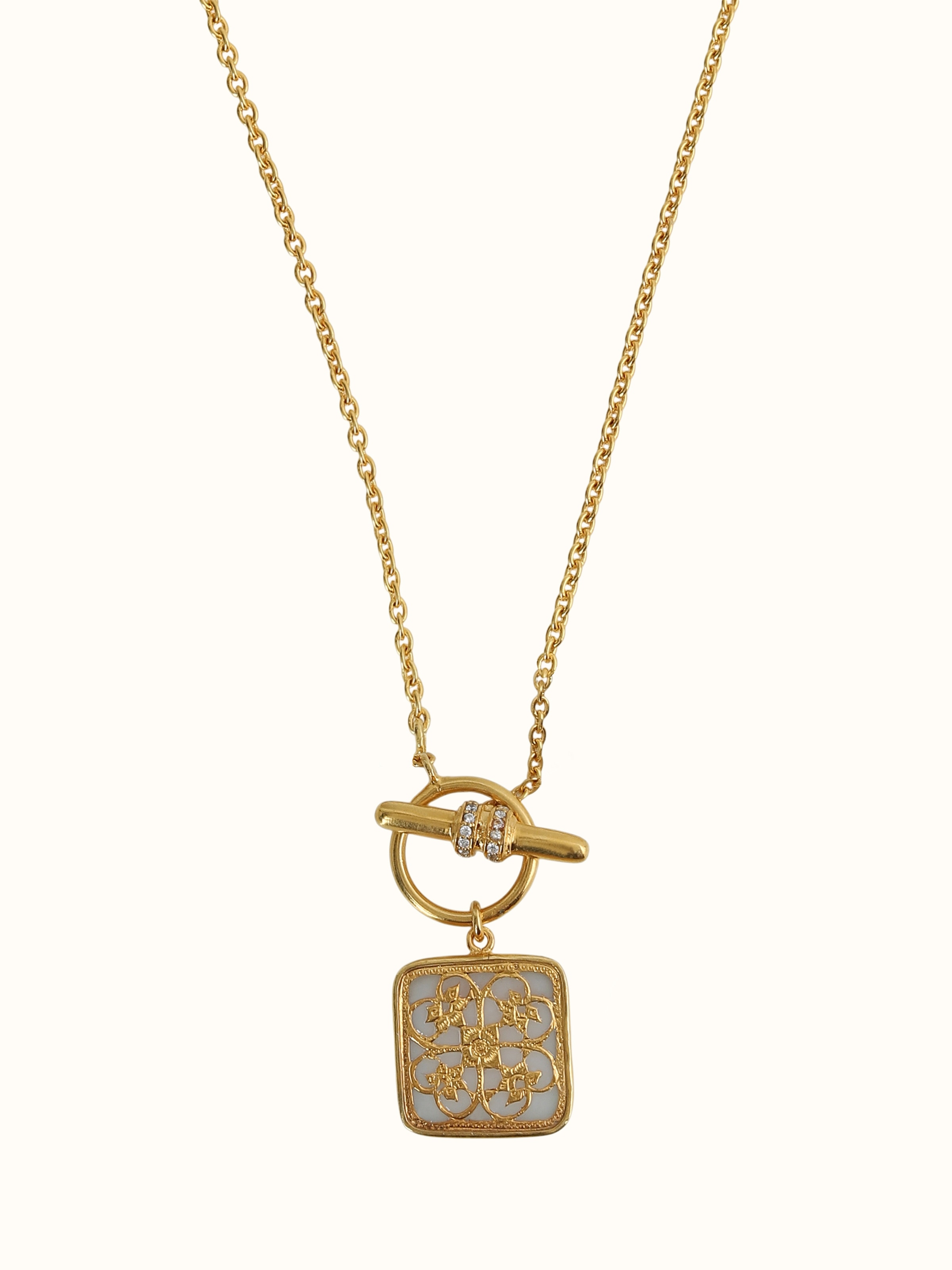 front view of thewa silver pendant and chain with intricate enamel work