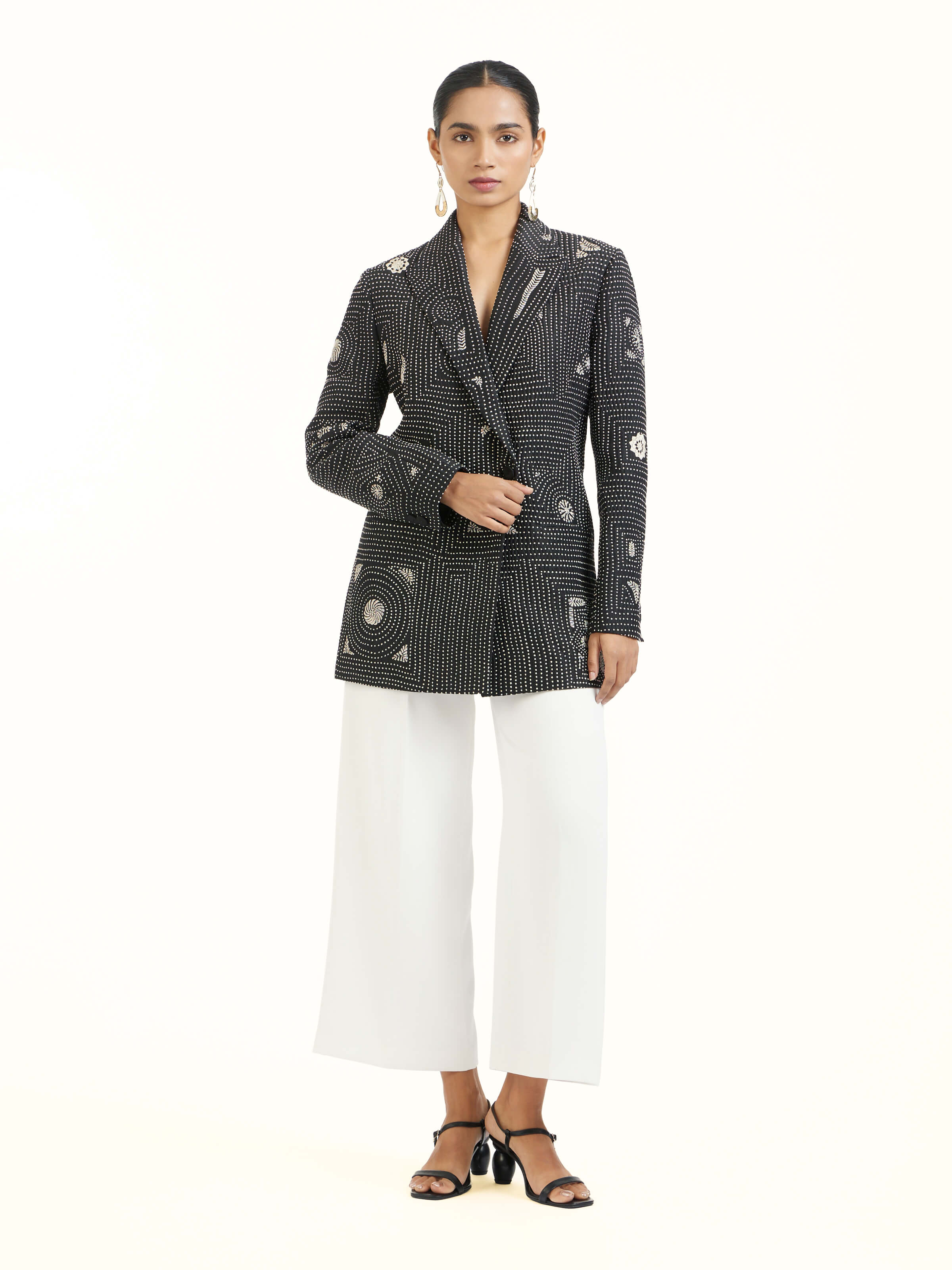 Front view of black silk kantha jacket with hand-stitched embroidery