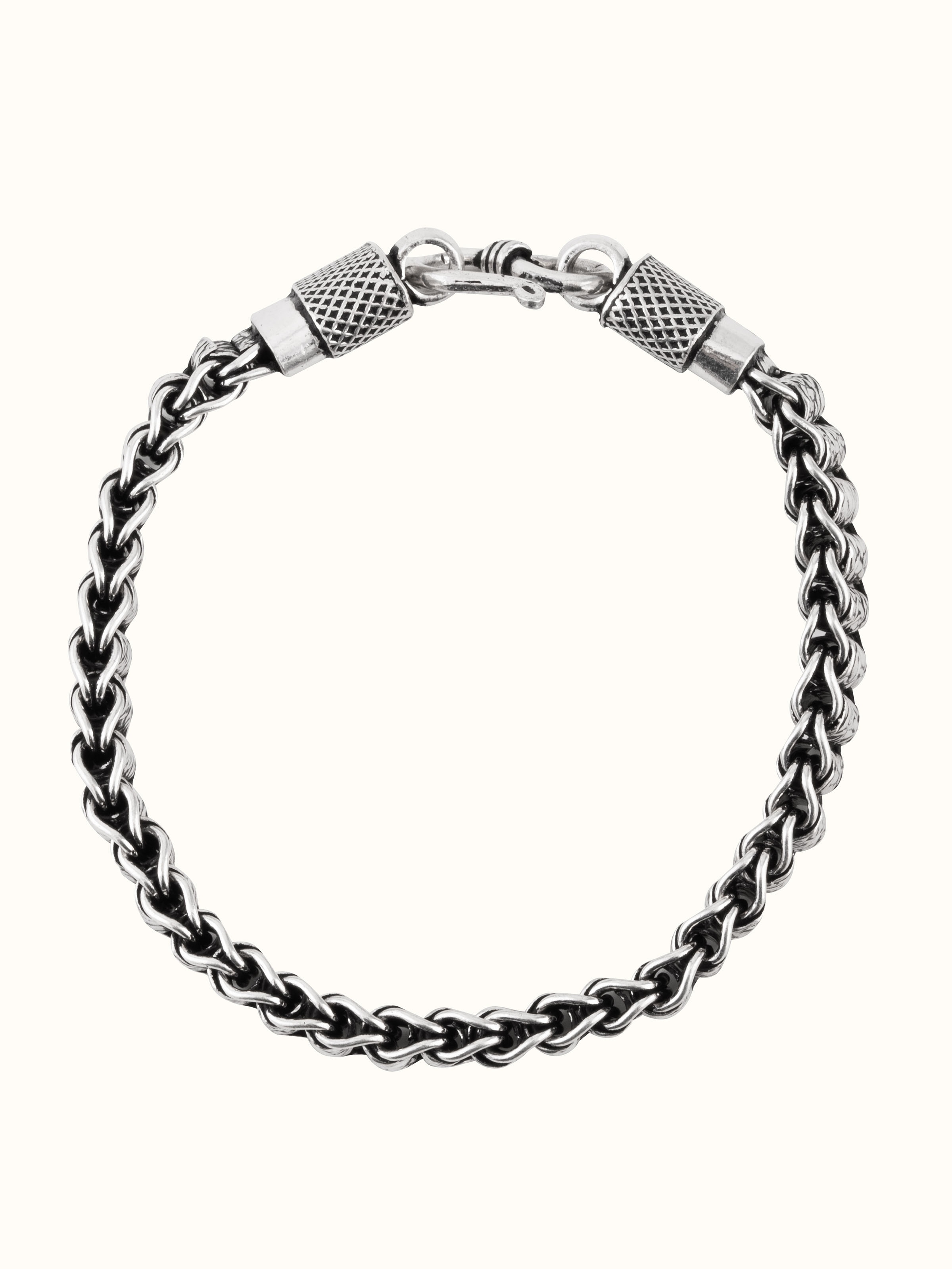 Front view of men’s silver flexi bracelet with modern handcrafted design and dark oxidized accents.