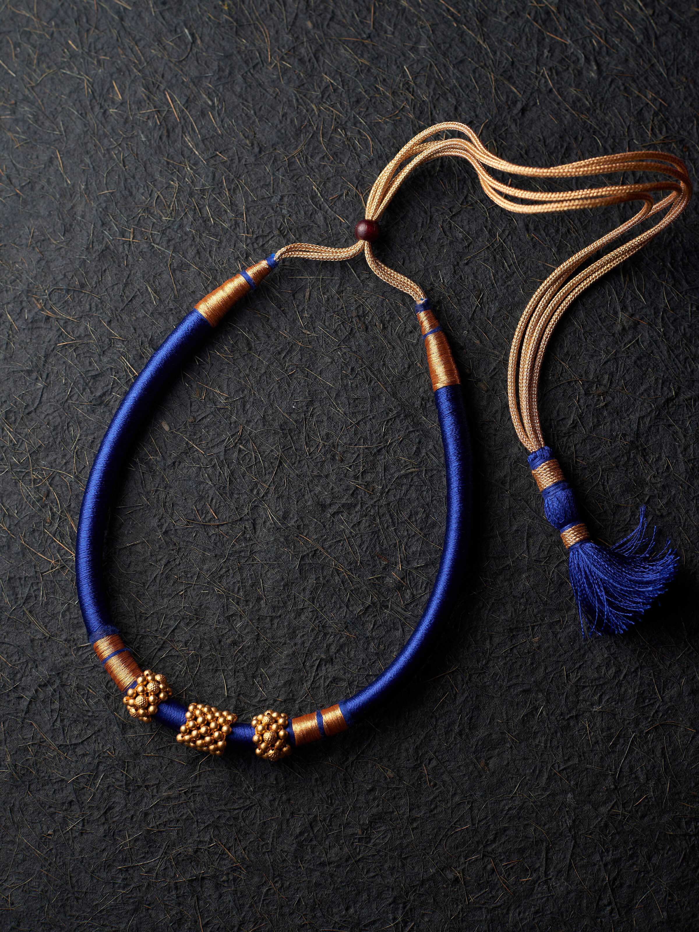 Thushi 22 karat gold collar necklace worn on neck – Swadesh