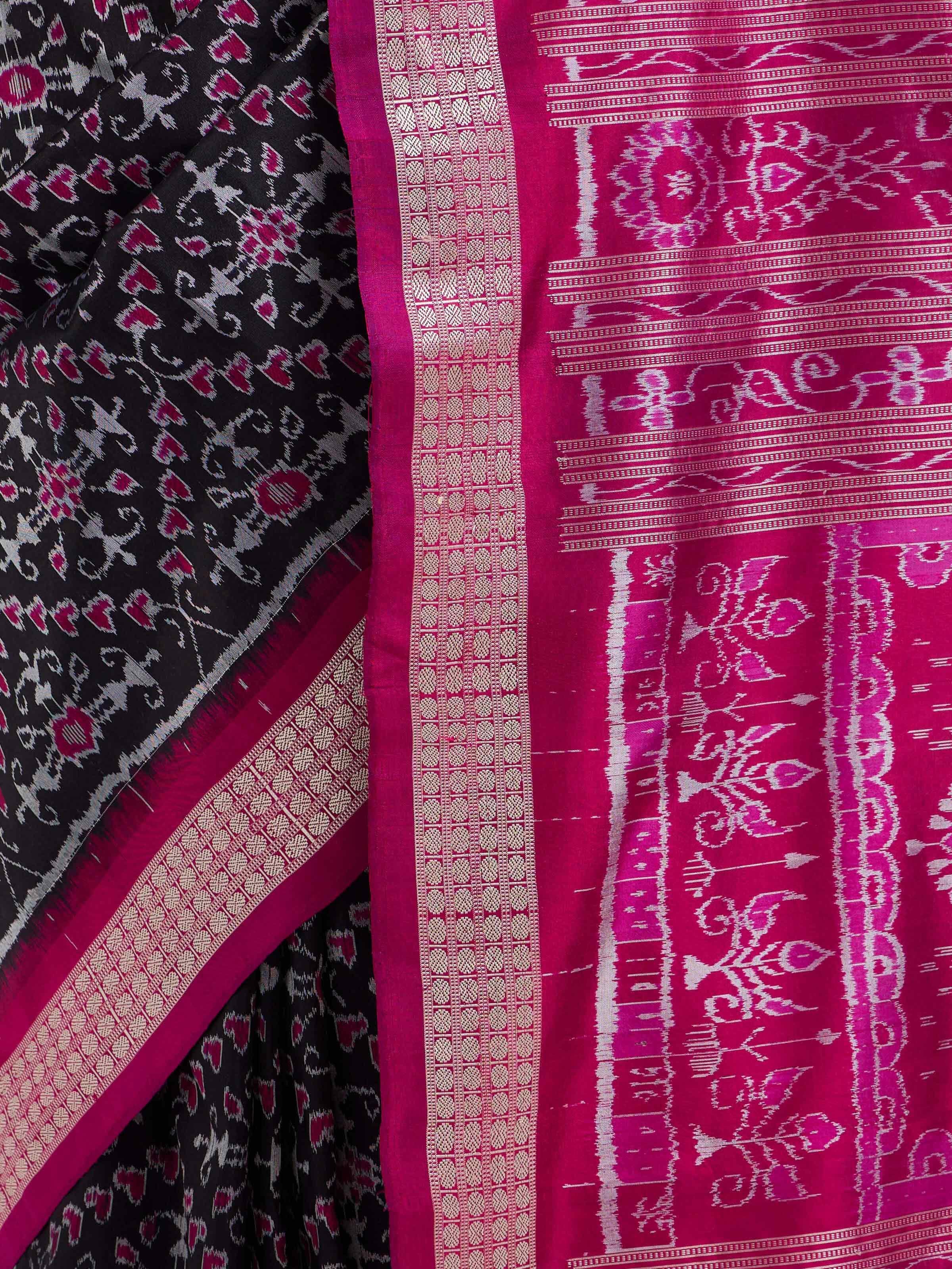 Detail view of black mulberry silk Bandha Odisha Ikat saree showcasing intricate patterns