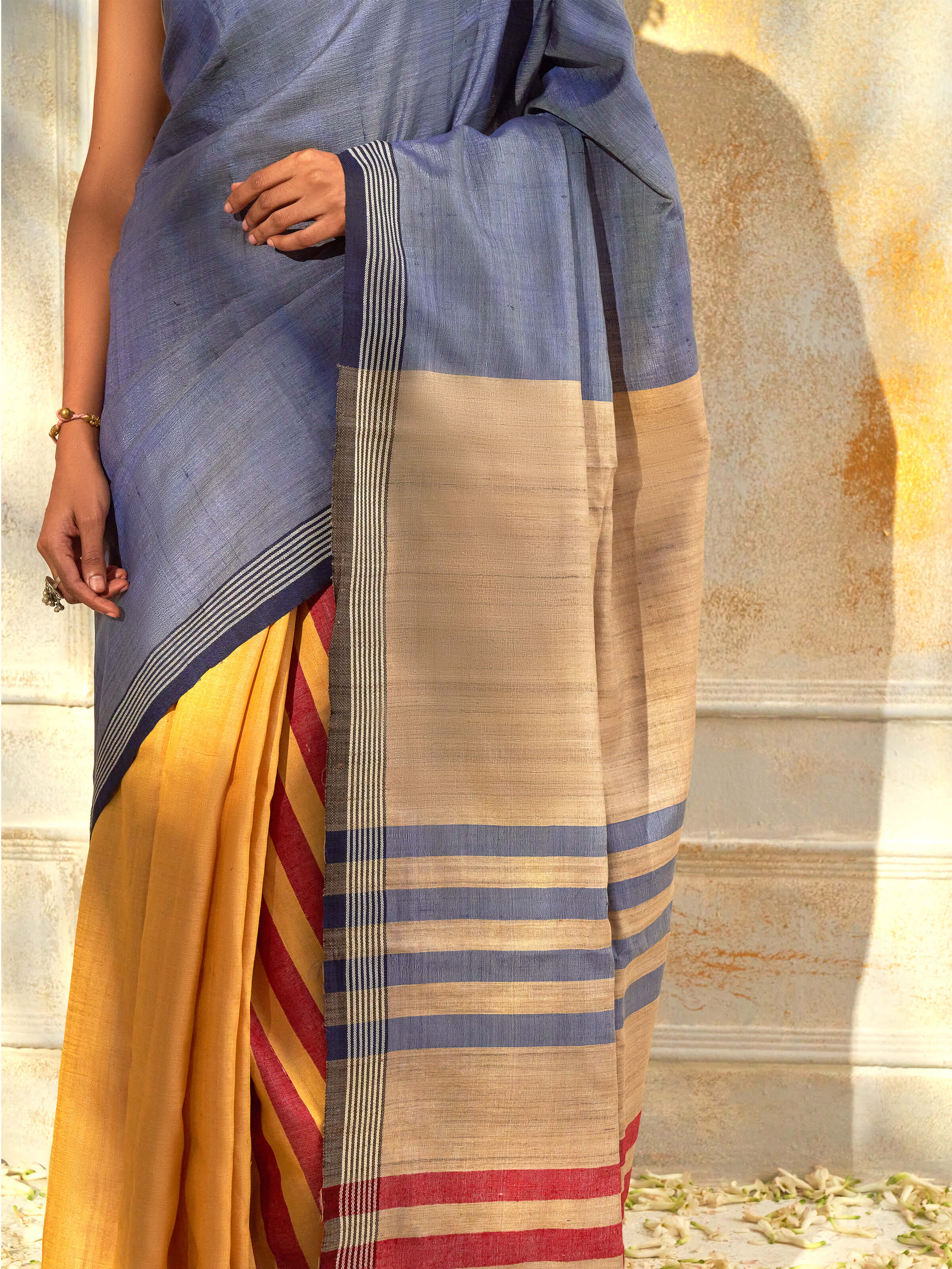 Detail view of blue tussar silk Bhagalpur saree with fabric texture and weave