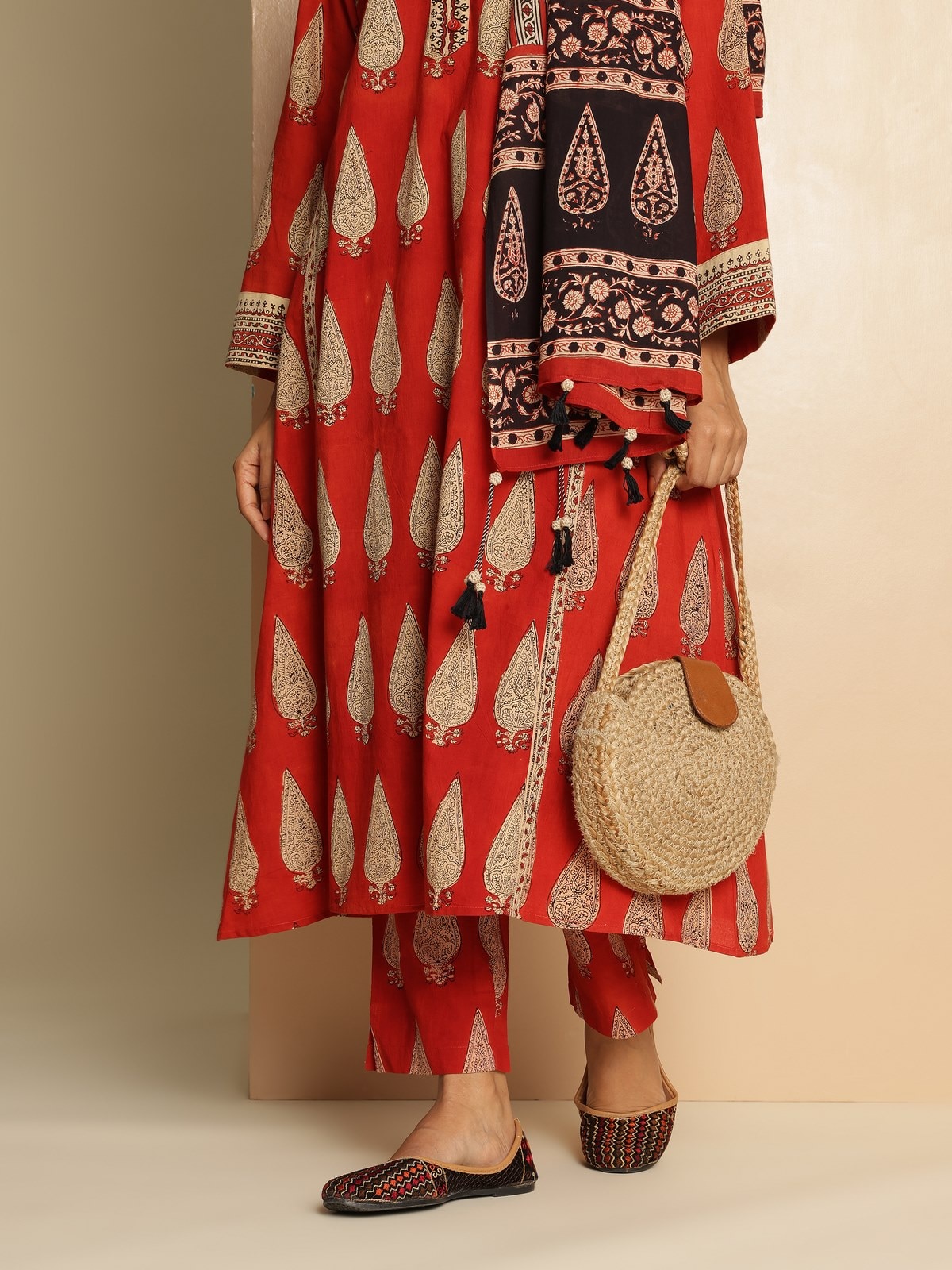 Close-up lifestyle view capturing vibrant red and natural dye Bagru patterns