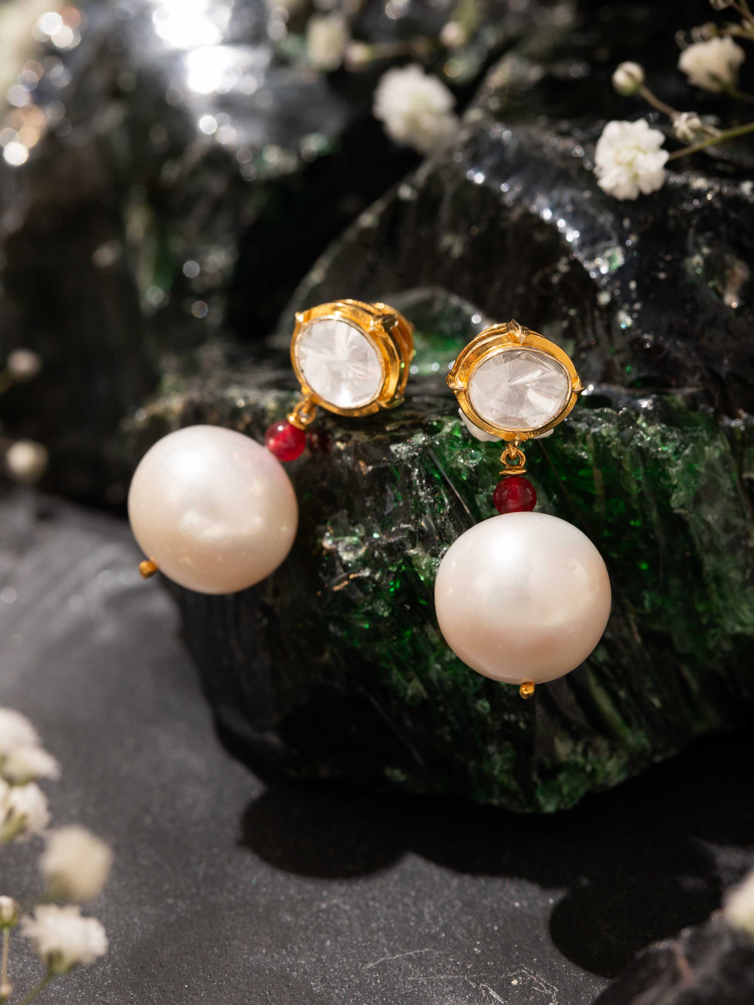 Alternate lifestyle view of Polki drop earrings showcasing their graceful dangle design